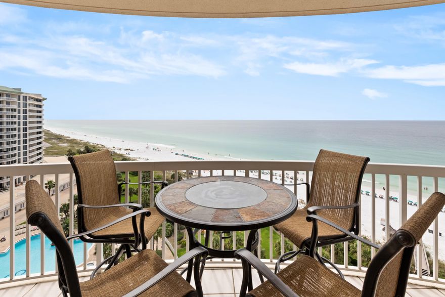 Rarely does a unit this pristine become available for purchase. Used only as a second home with designer furniture, custom draperies and accessories all included in sale. Your semi-private elevator enters into your foyer with fabulous leaded glass double doors. Upgrades galore -Travertine flooring throughout. All three baths remodeled. Top of the line Bain Ultra soaking tub in master bath. Quality wood cabinetry, granite,stainless appliances and custom backsplash. New light fixtures. HVAC system replaced. Covered balcony off master bedroom, main living and guest bedroom with expansive views of the Gulf, Sand, Sunrises and Sunsets. Deeded garage parking and locked storage cage. Complex allows vacation rentals with minimum stay. Complex includes fitness center, tennis, pool and spa.