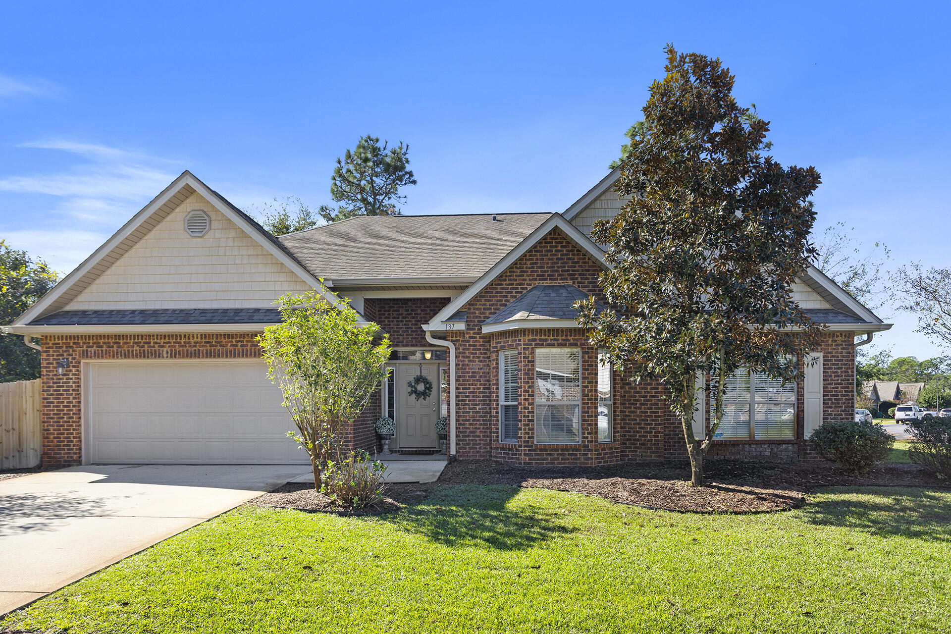 Come inside and allow this house to create a true home-feel. Nestled at the front of the Peach Creek neighborhood, this lot will catch your eye right away. Including 3 bedrooms and 2 bathrooms, it provides ample space for a family or anyone who enjoys having guests over. The floor plan converts from sectioned rooms to an wide floor plan by simply opening the surrounding doors.The sunroom is a versatile gem, bathed in natural light, making it an ideal spot for a plant-haven, a tranquil yoga studio for morning stretches, a cozy small office for focused work, or a playful area for kids or pets to enjoy. It's easily opened to the living area by double glass paned doors. The living room, with its pristine wood-burning fireplace, serves as a charming focal point, perfect for... ...cozy gatherings or simply as a beautiful display piece. The luxury vinyl planking throughout the house adds a touch of elegance and is easy to maintain, matching all colors and easy to love.

The exterior of the home has had a recent pressure wash, giving it a fresh, clean look. The backyard is set to be newly sodded, promising a lush, green space for outdoor activities. The reinforced fencing ensures privacy and security, making it an ideal spot for entertaining guests or enjoying quiet moments outdoors.

Situated on a corner lot, this home offers a generous outdoor area, perfect for hosting barbecues, holidays, or simply relaxing under the open sky. Whether you're an avid entertainer or someone who cherishes peaceful outdoor moments, this home provides the perfect backdrop for a fulfilling lifestyle.