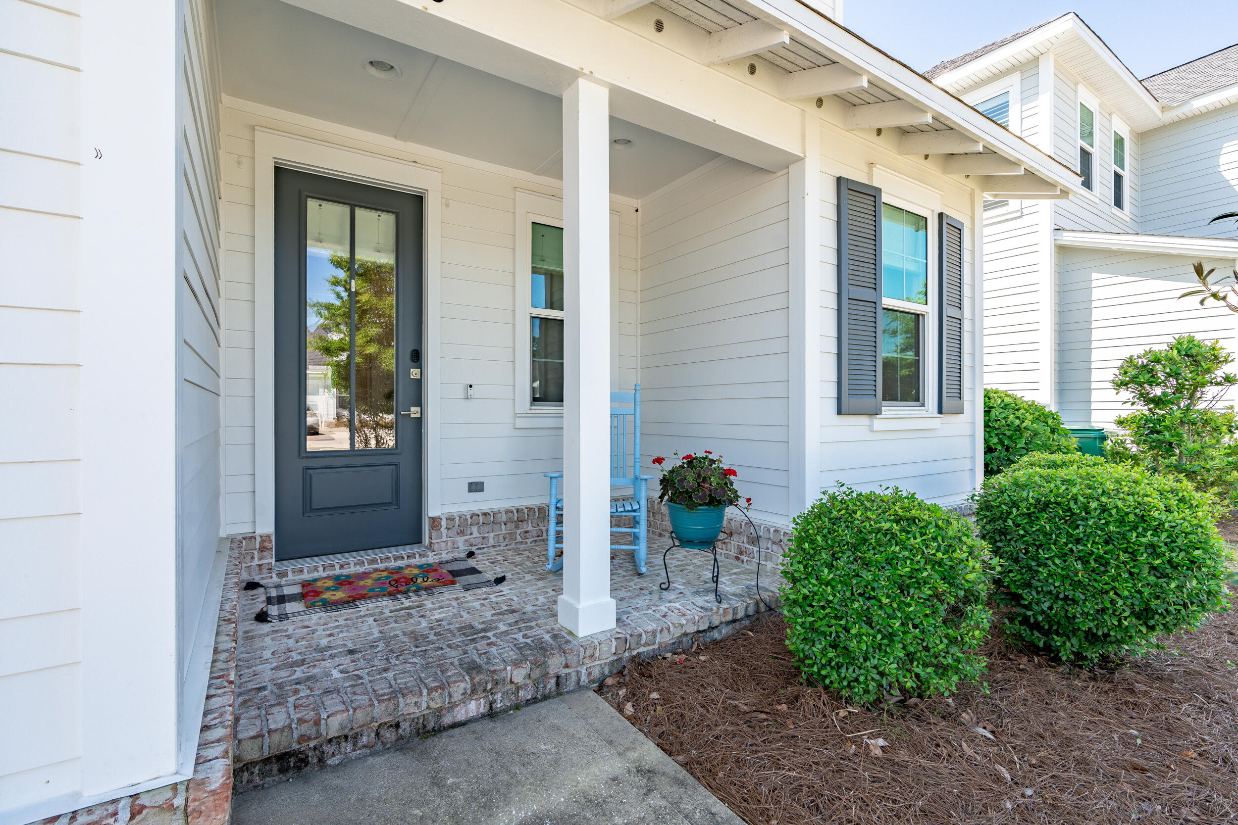 Watersound Origins is a unique 'Coastal Village' located on Northwest Florida's Emerald Coast between Pensacola & Panama City. This lifestyle community offers a range of amenities from golf and nature trails, to water sports and concerts on the events lawn. And let's not forget the resort style pool and well appointed fitness center.This is a 2 story home on a premium interior, corner lot which has impeccable features such as heirloom brick porch in the front and screened porch in the back. The picket fenced yard is manicured to a nature inspired design and easily kept lush and green with the irrigation system. Inside, you are greeted with 9' ceilings, luxury vinyl plank flooring and all of the upgrades your heart desires! To your right is the laundry and mud room with