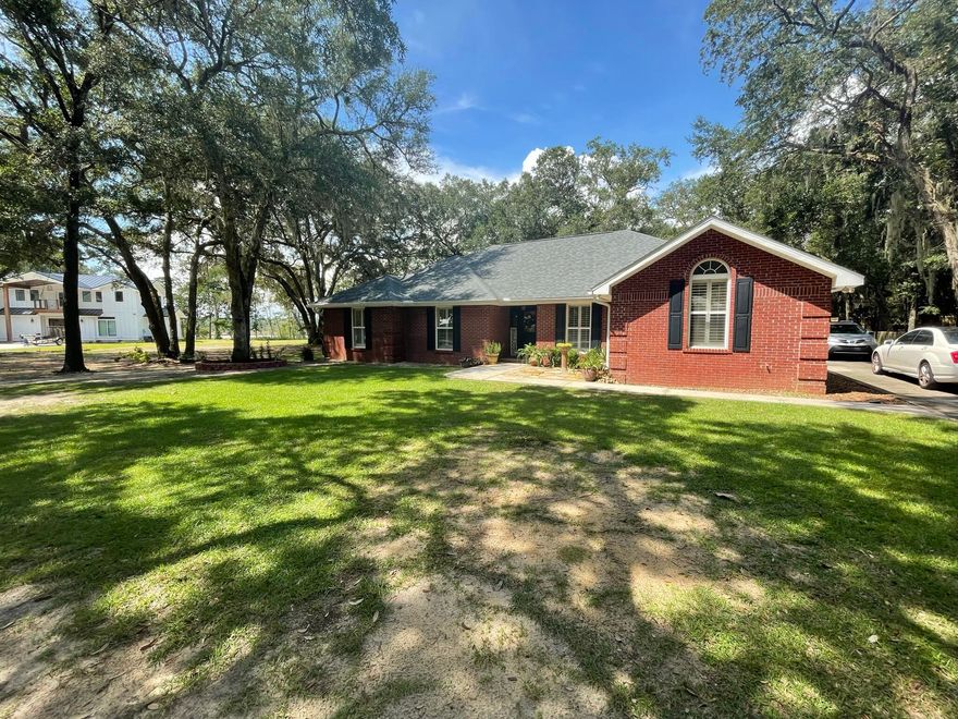 Entered for comp purposes only. This brick home with brand new roof was in excellent condition and had been meticulously maintained. Rare opportunity in Waterview Cove, where you get the benefit of a community, without the HOA. Spectacular sunsets from your waterview lot and back screened porch. Oversized estate lot at .56 acres with mature oaks for shade. Vaulted ceilings, laminate flooring, corner fireplace, plantation shutters & split floor plan. Master bath recently updated with separate tile shower, deep soaking tub and separate vanities. Home came equipped with central vac and a large utility room inside, along with another heated & cooled storage room accessed from the outside. 2 car carport + 1 car garage. Home sold to the neighbor before coming on the market.