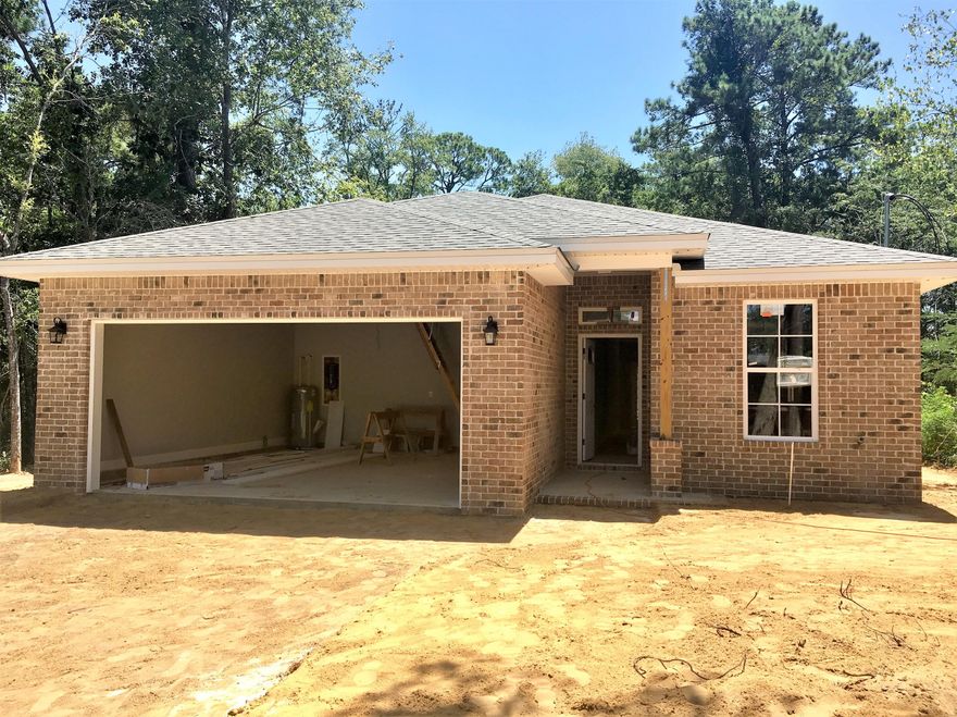 A BRAND NEW, beautiful, 3 bedroom, 2 bath home!! Great location and with-in walking distance to the bayou. EXTERIOR FEATURES: all brick exterior, fenced in back yard, 2 car garage with auto opener, irrigation system, full landscaping, large back porch. INTERIOR FEATURES: espresso cabinets, granite kitchen counter tops, marble bathroom vanity tops, stainless steel kitchen appliances, tile in foyer/utility/bathrooms, carpet in bedrooms, laminate wood flooring in all other areas, large crown molding in main areas, large baseboard throughout, plenty of storage. OTHER FEATURES: A 1-yr builder warranty is provided, seller will pay a TOTAL of $4000.00 towards ALL closing cost (buyers & sellers), title & closing to be held with Tammy Jones at First National Land & Title.