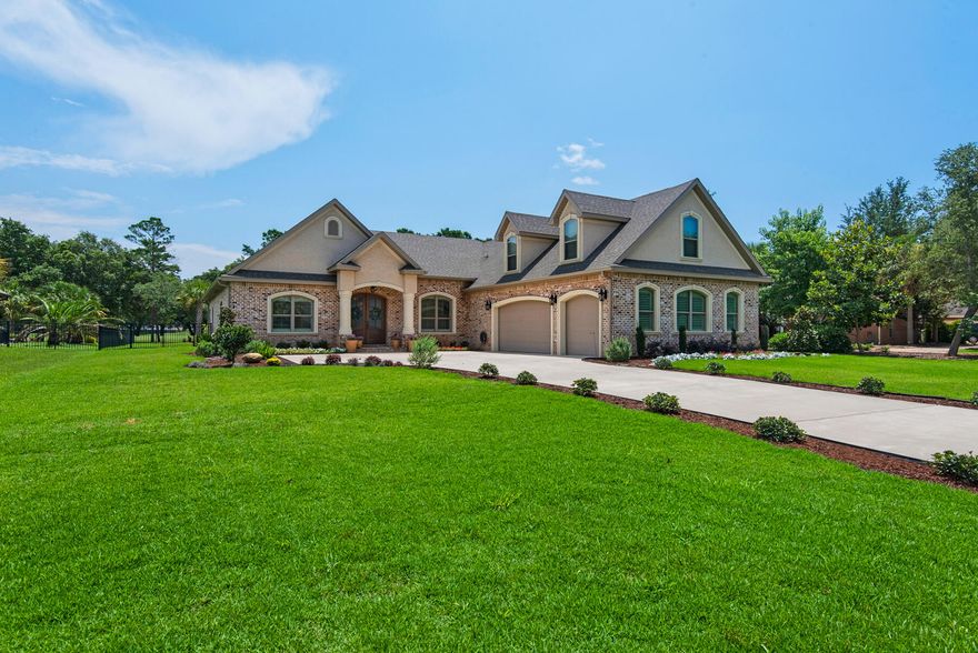 Beautiful golf-course, pool home in prestigious Hidden Creek Estates. This heavily upgraded custom home overlooks the picturesque 14th and 15th fairways. Immaculately maintained, this home is sure to impress with all high-end finishes, fantastic curb appeal, 3,036 square feet of living space with 4 large bedrooms, a large office (which could be used as a 5th bedroom), 3 full bathrooms, and a massive outdoor covered lanai with wood burning fireplace overlooking the heated, in-ground pool with spa. Enter this open and bright home through 8ft arched mahogany double front doors with flemish glass.