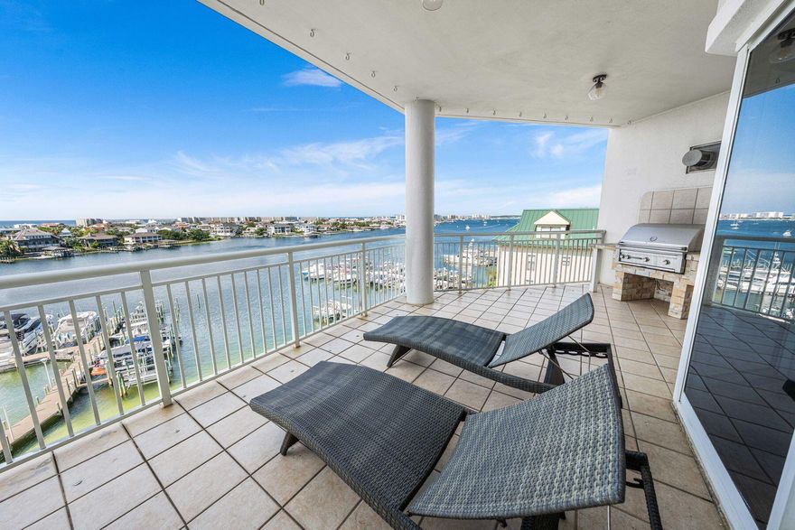 Assumable VA Loan @ 2.75% Perched upon the prime west end of Grand Harbor's 5th floor, this 4BR/4BA residence offers uninterrupted views of both the Gulf of America and the Destin Harbor. The oversized balcony takes in harbor views with the Gulf beyond, and a built-in gas grill ready for sunset dinners. Inside, the living area flows into a remodeled kitchen with quality finishes, while 9.5' ceilings and plantation shutters keep it sharp and coastal.A full wet bar makes entertaining effortless, and every bedroom offers its own private bath. Generously sized rooms and wide sightlines keep the views in focus, with Harbor and Gulf panoramas carrying through the primary suite, guest bedroom, kitchen, living room, and dining area, which can easily convert to an additional living space if preferred.

Within the gates, Grand Harbor is a sanctuary of quiet exclusivity. A secure parking garage, private marina access, fitness center, clubhouse, heated waterfront pool, and a reserved guest suite ensure comfort for owners and their guests. With no short-term rentals permitted, the community remains private, neighborly, and serene.