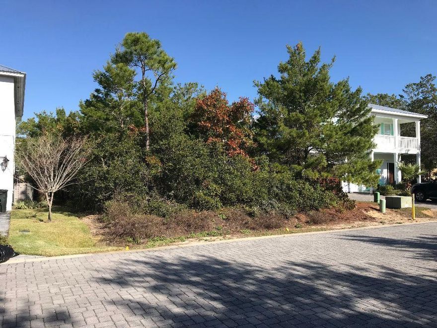 Build your dream home or second or vacation rental home within this private brick paved street community. Enjoy community room and pool and the most beautiful beaches through a perpetual beach access easement located just minutes away. Close to golf, restaurants, shopping and theaters. Buyers are responsible for verifying all measurements, dimensions, setbacks, utilities, assessments and environmental and construction restrictions.