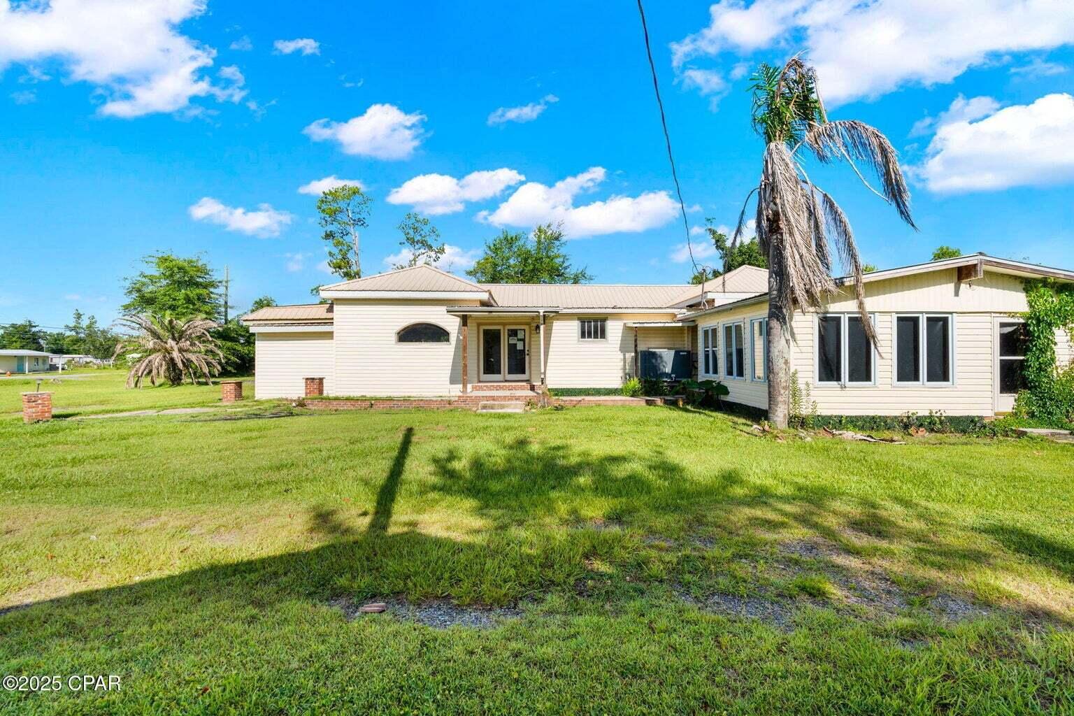 Builder's dream. Investor's jackpot. This 1.49-acre R-2 zoned lot off Hwy 2321 in Southport is packed with potential. With 4,032 sq ft of total heated space--including a main home, 900 sq ft apartment, and detached suite--the structures need full renovation or teardown. The real value lies in the land: zoned for multifamily or duplex use, and eligible to be split into two parcels if the main home is removed. No HOA or subdivision restrictions. Highway frontage offers possible future commercial rezoning--ideal for new builds, dual rentals, or a business site. Rare opportunity in a prime, high-visibility location. Don't miss out--schedule your showing today and bring your vision to life!