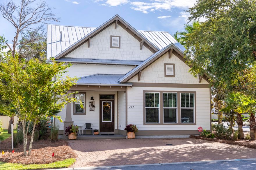 Home is Under Contract with right to inspect/cancel contingency.....showings are welcome. Great 3 bedroom 2.5 bath home in Grande Pointe with master bedroom on first floor along with living, dining, kitchen, laundry and a half bath all on the main floor! Two bedrooms and a full bathroom on second floor. This home was built by Holiday builders and features an open floorpan with hardwood flooring throughout, impact windows, oversized shower in master, and great outdoor space. The kitchen is upgraded with stainless steel appliances, quartz countertops and a gas range. This home sits on a corner lot located near the lakeside community pool and pavilion. Just steps to the pool or a short bike ride to the Gulf of Mexico, 30Avenue or all that 30A has to offer.