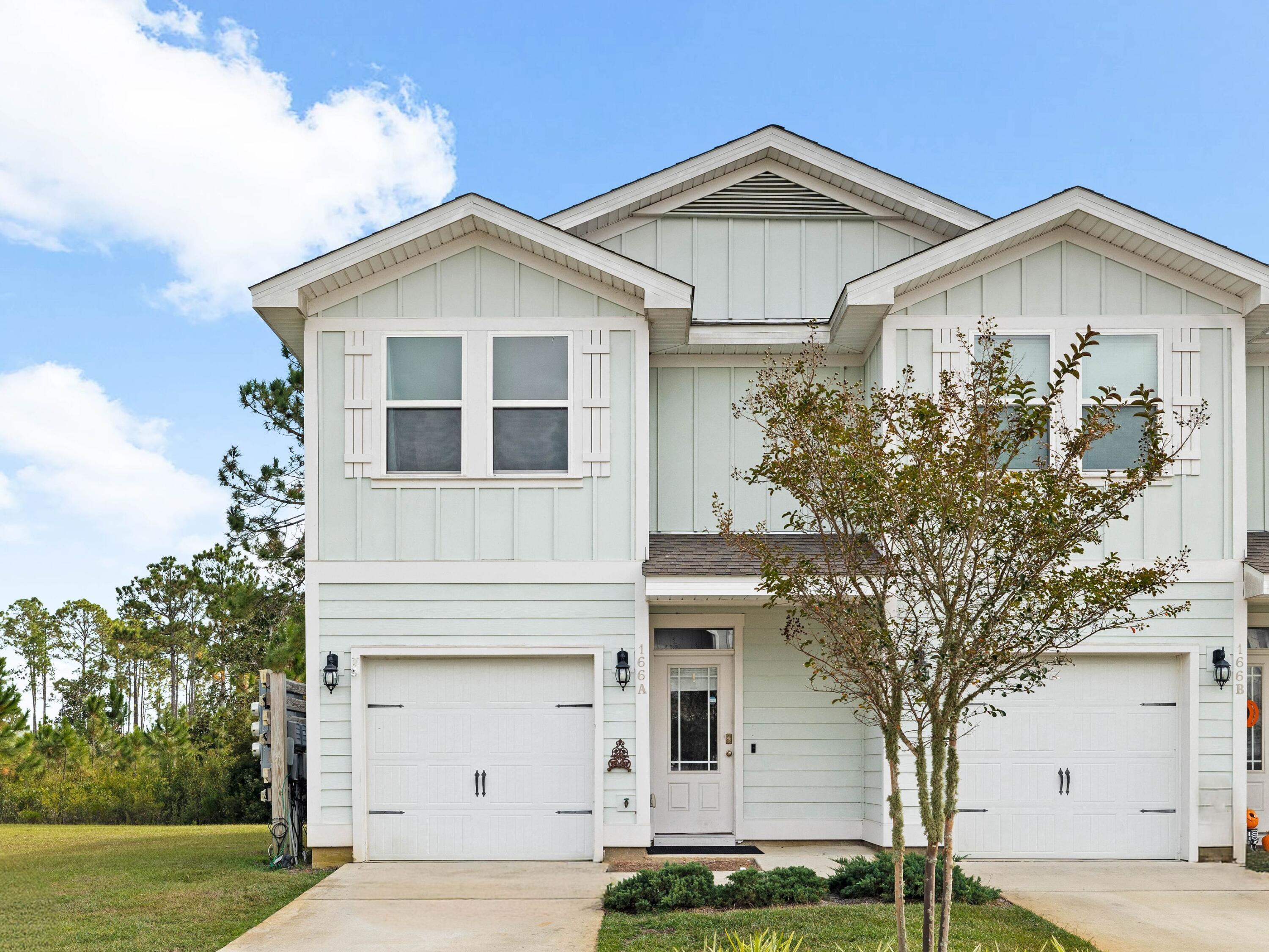 Welcome to your new home at Miller's Crossing, where modern townhome living meets serene surroundings. This beautifully designed end-unit townhome offers three bedrooms and two-and-a-half bathrooms across 1,542 square feet. It stands out as one of the larger floor plans in the community, brimming with natural light that enhances every room.The layout features a spacious living area that flows seamlessly into the dining and kitchen spaces. The attached garage adds convenience and security. Direct access to the community's common space and cul-de-sac enhances the home's connection to nature. The property presents a fantastic opportunity, not only for first-time buyers dreaming of their first home, but also for investors looking for a solid long-term rental option.
Nestled in a vibrant community, Miller's Crossing features a dog park, expansive green spaces and a scenic nature boardwalk that invites tranquil walks. Located conveniently to shopping hubs and just a short drive from the beach, this neighborhood is perfect for those who cherish accessibility while benefiting from the surrounding preserved lands. Don't miss this opportunity to own a home in a location with limited surrounding development, ensuring your peace and privacy for years to come.