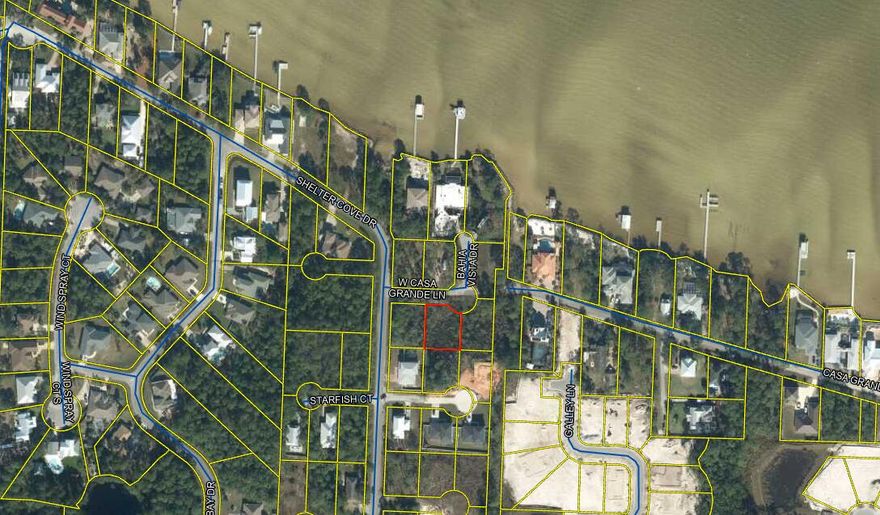 Discover your dream lot! This prime location, just steps from Choctawhatchee Bay, offers the potential for captivating bay views. Minutes from Grand Boulevard shopping and the pristine white sands of 30A, this lot is your gateway to coastal paradise. Don't miss this rare opportunity!''