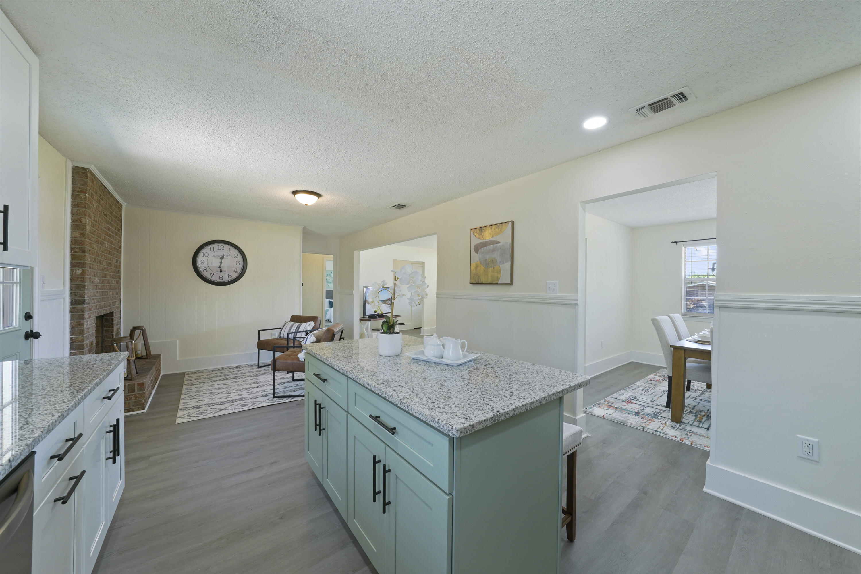 **SELLER WILL PAY TITLE AND UP TO $8000 IN BUYER CC!** Welcome to your dream home! Just 3 miles West of Hurlburt Field, this newly renovated gem boasts a contemporary interior with 3 spacious bedrooms and 2 modern bathrooms. As you pull up to the house, you'll be greeted by a charming brick exterior and large front porch. All exterior trim, siding, and doors have been recently painted for a fresh look. Step inside to discover a bright and airy home. The newly painted walls and brand-new LVP flooring provides for a stylish, cohesive feel. The living and dining rooms, kitchen, and sitting/breakfast area are all visibly highlighted in the open concept floor plan. With large windows in both the living and dining rooms, you will enjoy plenty of natural light. These spaces are perfect for entertaining, as all guests will feel a part of the fun no matter which room they are sitting!
The kitchen is a chef's delight, equipped with all new stainless steel appliances, Shaker-style cabinets, and new granite countertops. The vertically-stacked, glazed subway tile in French Canvas creates a warm, sophisticated elegance. You will have plenty of space for both meal prep and sitting, with the 5 foot long island in Sea Salt Green. Off the kitchen, you have the dining room to the left, and a sitting area with fireplace to your right. The sitting area, with its versatile location, can double as a breakfast area, office space, or reading nook!
The master bedroom is a private retreat, complete with two closets and an en-suite bathroom. It is rare to find a bedroom of this size in an older home, but with over 275 SF of space, you can easily fit a complete bedroom suit with King size bed, as well as a desk, bench, and/or chaise lounge! The master offers its own private entrance/exit to the backyard and patio, with a modern sliding glass door. The master bath boasts a large vanity with granite countertops; contemporary matte-black lighting, mirror, and hardware; plus a tiled walk-in shower.
The 2 additional bedrooms are equally as spacious, and share a beautifully updated second bathroom with new bathtub and porcelain tile surround. Custom-built shelving and a 42-inch vanity with granite countertops will provide you will plenty of storage, as well as personal grooming space.
One of the stand-out characteristics of this home is the sizeable backyard. The concrete patio is perfect for outdoor dining, or simply relaxing, while enjoying your serene sanctuary. The backyard is accessible from the kitchen, master bedroom, and garage. The fenced yard provides added privacy, and is rounded out with a large storage building for housing yard equipment, tools, and/or children's toys.
With a Brand New ROOF, New WATER HEATER, and Newer HVAC (2017), you get a practical home, as well as beautiful one! Located in a quiet, friendly neighborhood, you'll enjoy the easy access to schools, military bases, beaches, and shopping. Don't miss this opportunity to make this charming, move-in-ready home yours!