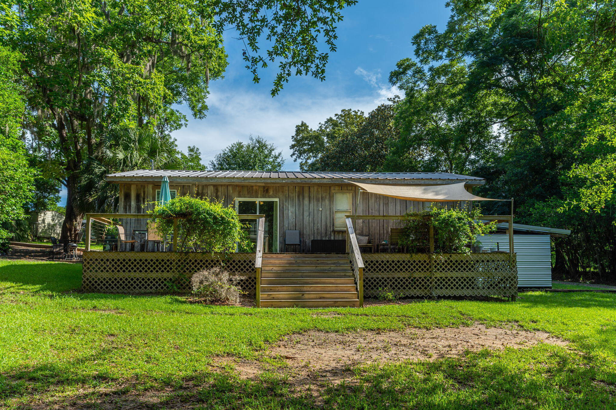 Looking for the perfect place in Florala, AL with amazing views of Lake Jackson - this 2BR /1BA cottage has everything to offer. Overlooking Lake Jackson on 0.60 of acre the location cannot beat. Like NEW and completely remodeled, the Cottage was long used as a well-established Air BNB and comes with tons of room to add an additional home to the property. Home offers an easily functioning kitchen, great living room area, full bath includes a tub and the home offers tons of outdoor areas to relax on the deck as well as storage for all your Lake toys. Florala offers all the convivences and small town living within an hour to the Beaches - this property offers the best of all worlds - low taxes, low insurance, golf cart friendly community, and great location to Eglin AFB.