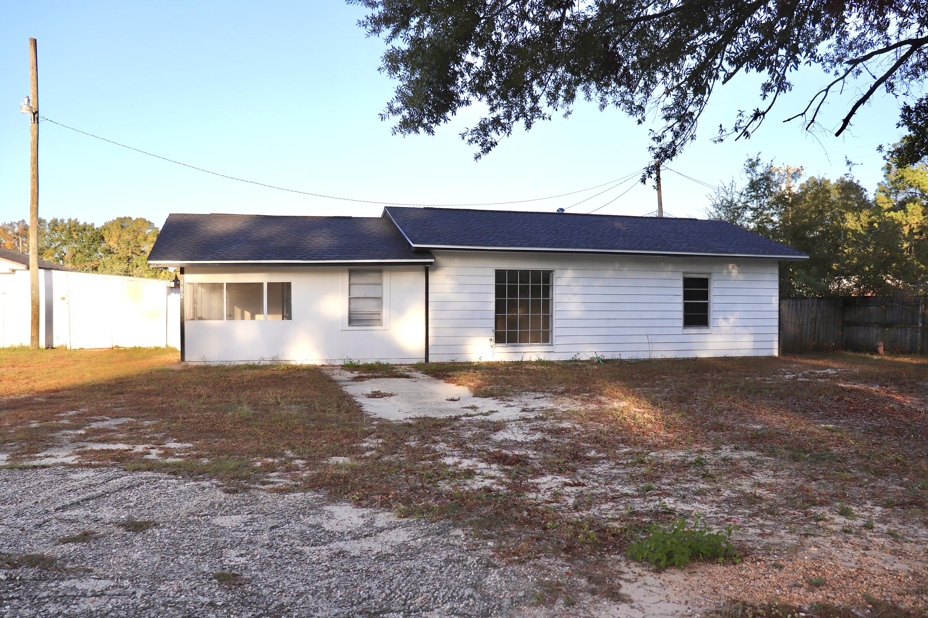 This fully renovated 2-bedroom, 1-bathroom home at 302 Edgewater Drive is ready to welcome its new owners. With a new roof, flooring, fresh paint, new plugs and switches/lighting updated in 2023.  The screened-in porch and fenced backyard offer plenty of outdoor space, while the shed and workshop building convey as-is. This home is perfect for anyone seeking a move-in ready property.