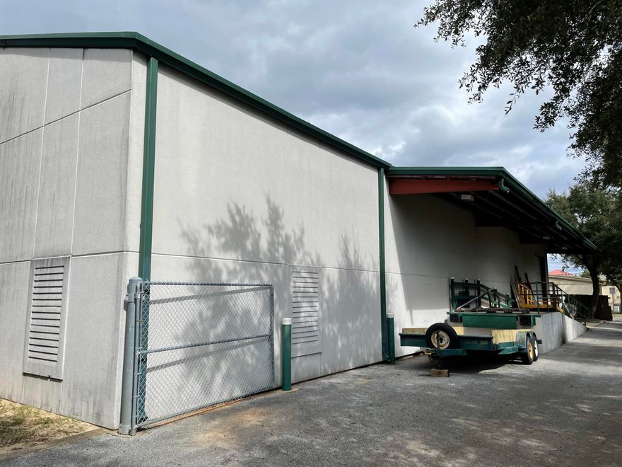 This is a large 5,000 sqft warehouse building located in the heart of Fort Walton Beach, just off of Eglin Parkway on Carson Drive. The warehouse features a loading dock and a roll-up door.