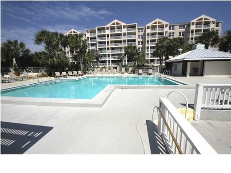 Awesome LOCATION, & Deal !!! Make offer on this Lowest priced condo in Magnolia House On Holiday Isle in Gated Destin Pointe. Look out your balcony to a gorgeous back drop of The Gulf of Mexico- East Pass and Magnolia House Pool. This spacious 1 bedroom 1 bath condo features an expansive terrace and a front porch/lanai for your morning coffee or a great area to keep all your beach toys. New carpeting was just installed. Destin Pointe is one of the most premiere beach communities on the coast. Activities galore for you and your family. This unit is currently on the Rental Program and has a nice rental history. INVESTORS look no further- Priced to be Sold as if it were back in the late 1990's.
