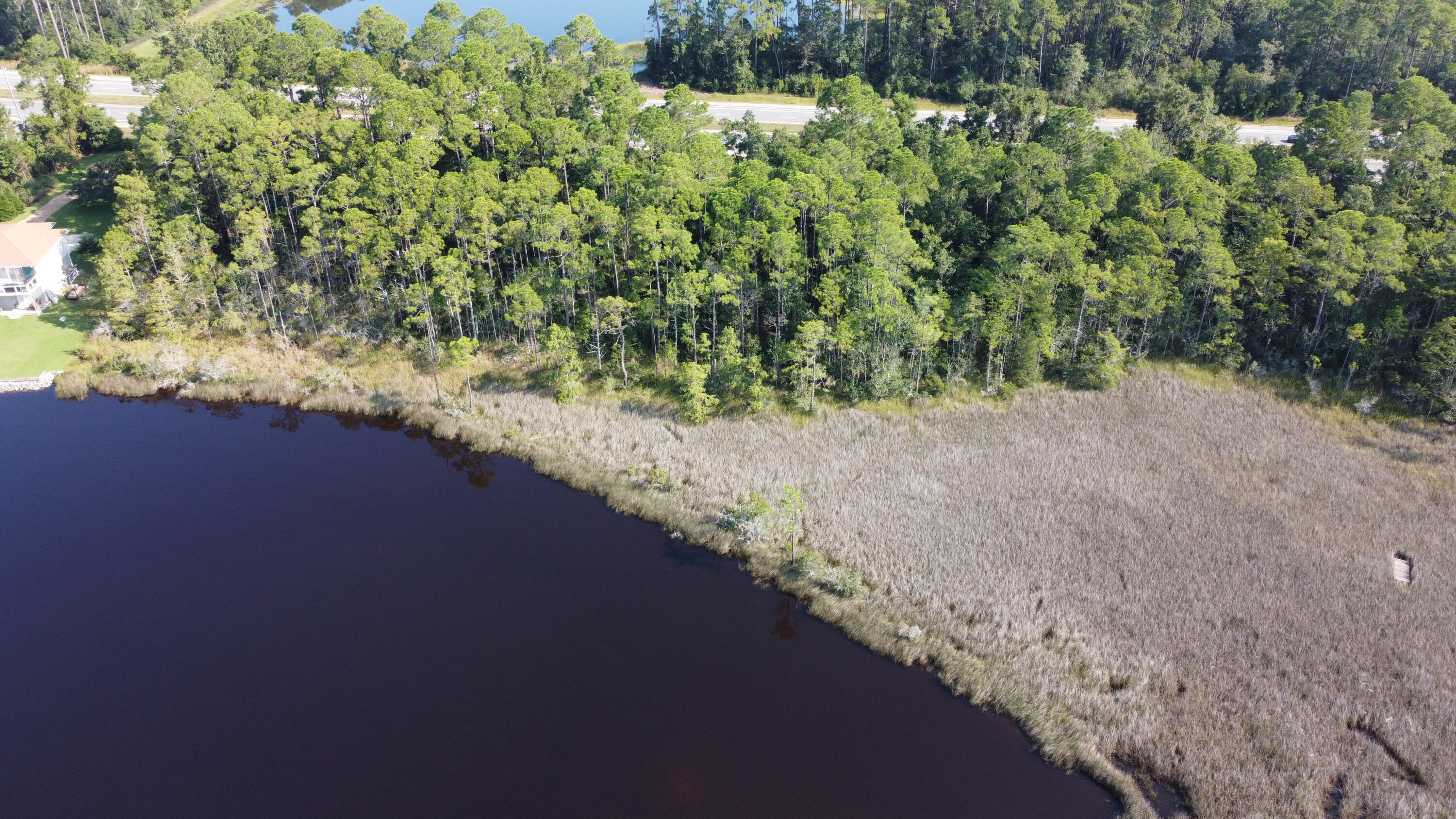 Beautiful lot on East Bay with over 140 feet of waterfront! Easy access to the lot from Highway 87. Perfect to build your dream home on the water!