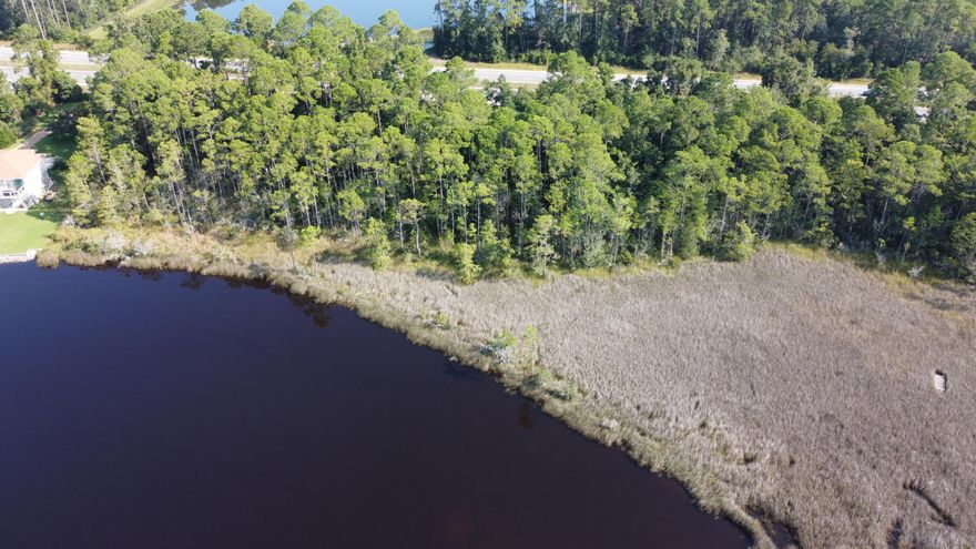 Beautiful lot on East Bay with over 140 feet of waterfront! Easy access to the lot from Highway 87. Perfect to build your dream home on the water!