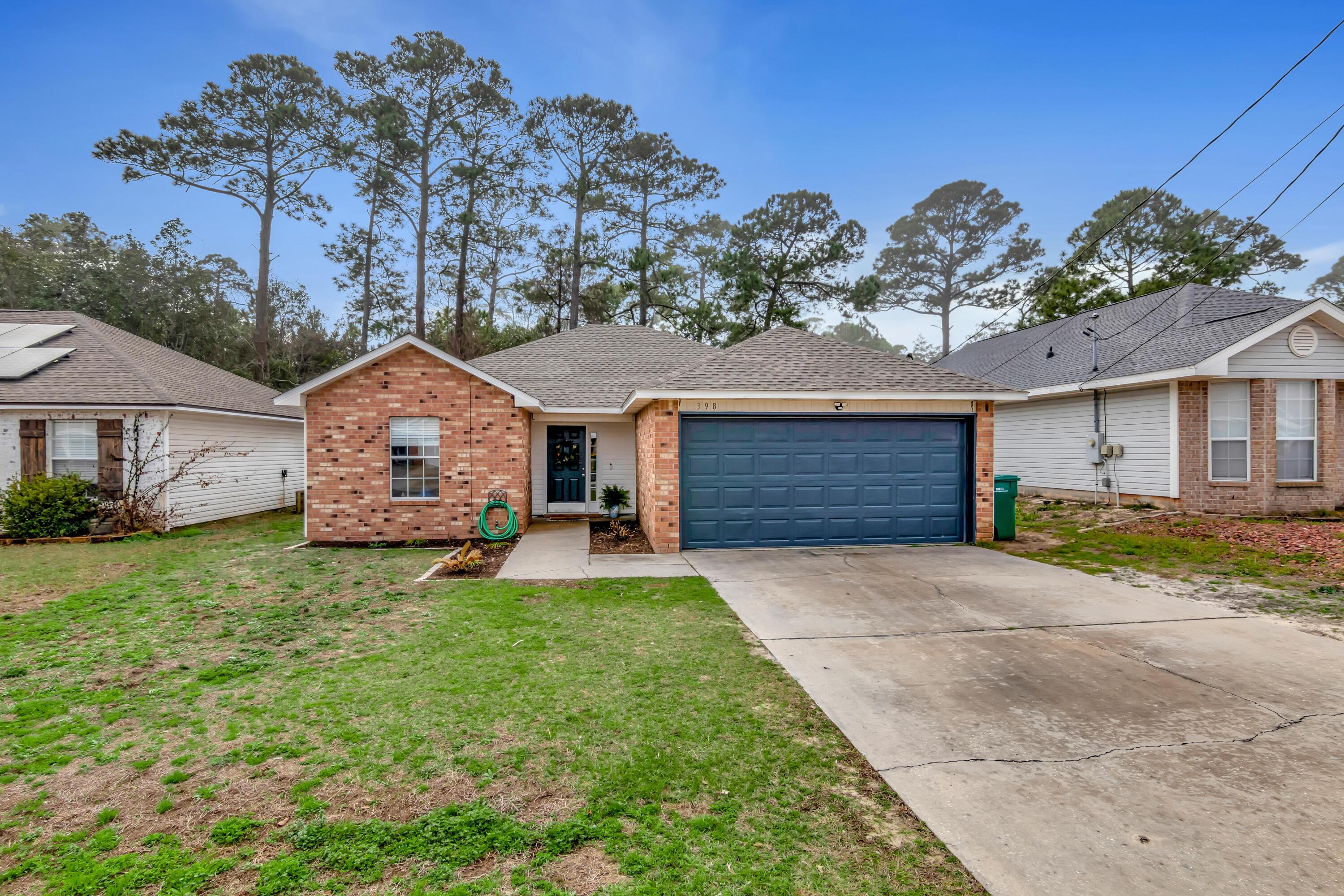 Is this your new home? Come take a look! Located in Waterford Estates, this contemporary 3 bed, 2 bath home embraces a spacious floor-plan, sizable bedrooms, raised tray ceilings in the dining room, substantial kitchen with a breakfast bar and a large fenced backyard. This property is perfectly positioned in Mary Esther, and is a short commute to shopping, schools, and a 5 minute drive to Hurlburt AFB. The home is well-kept on all maintenances and in great condition. Roof, HVAC, paint, tile-wood flooring and kitchen counters are from 2021-2022. Come see what 398 Pristine Water Lane has to offer!