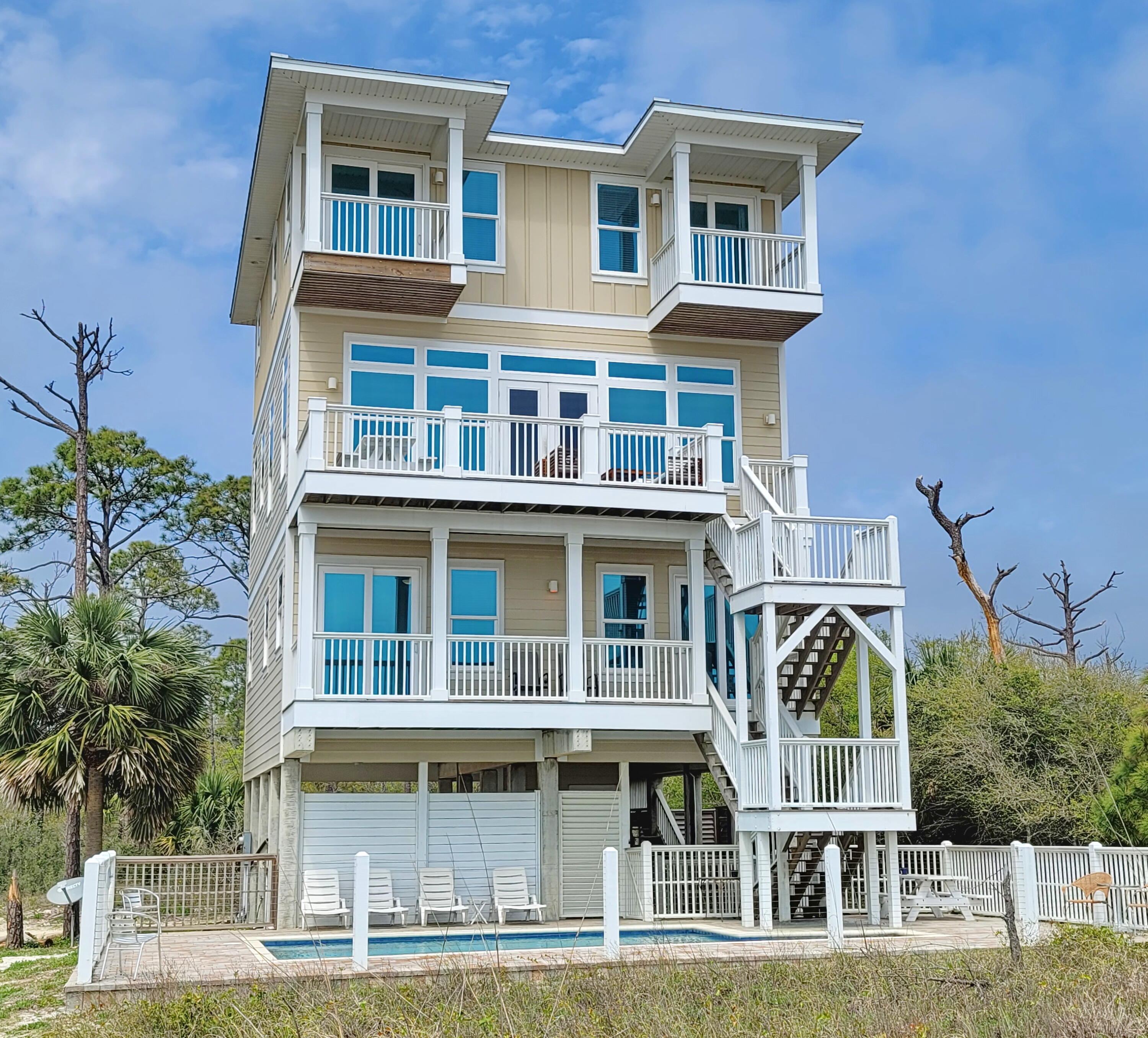 UNDER CONTRACT ~ TAKING BACK UPS! Great beachfront home with an established rental history. Heated pool, elevator, and terrific peaceful location on the Gulf with amazing views. With 6br's and 6.5ba this home has room for all of your friends and family and accommodates 16 guests which also makes this a great rental that grossed approximately $170k in both 2021 and 2022 . Awesome Gulf front decks, high end finishes, large open living concept living area overlooking the beach. Sold furnished and equipped.