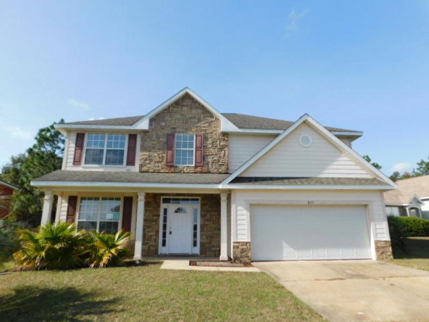 Large 4 bedroom, 2.5 bathroom two story home located the desirable Sandy Ridge Subdivision! Just south of 1-10, this home is convenient to bases, shopping and schools. Downstairs has plenty of living space that will make entertaining a breeze. The large kitchen features granite counter tops, stainless steel appliances and cabinets with plenty of storage room. Great sized bedroom all located upstairs. Master bedroom has trey ceilings and fantastic master bathroom. Master bath features double vanity, tile flooring, garden tub and separate shower. THIS PROPERTY MAY QUALIFY FOR SELLER FINANCING.