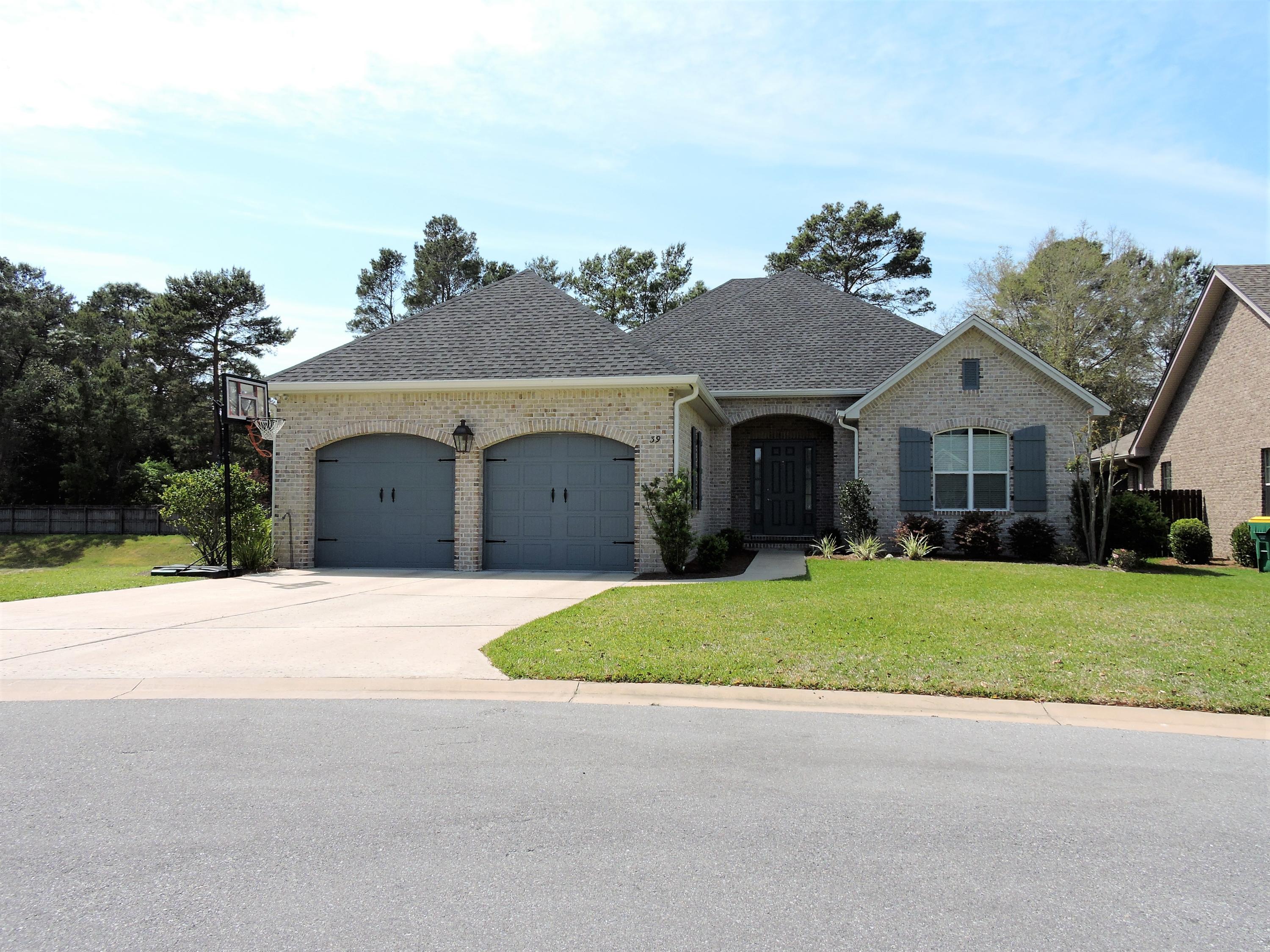Third phase of Magnolia Woods, Built by a premier builder in our area, just minutes from Eglin AFB, top rated schools and the beaches of Destin. Gorgeous interior features include an open concept floor plan, 8' doorways throughout, wood and tile flooring, granite counter tops, Legacy cabinetry with soft hinges and drawers, stainless steel appliances and much more! Full landscaping and irrigation included, along with screened porch. Additional 400 sq ft added with bonus space after house was sold.
