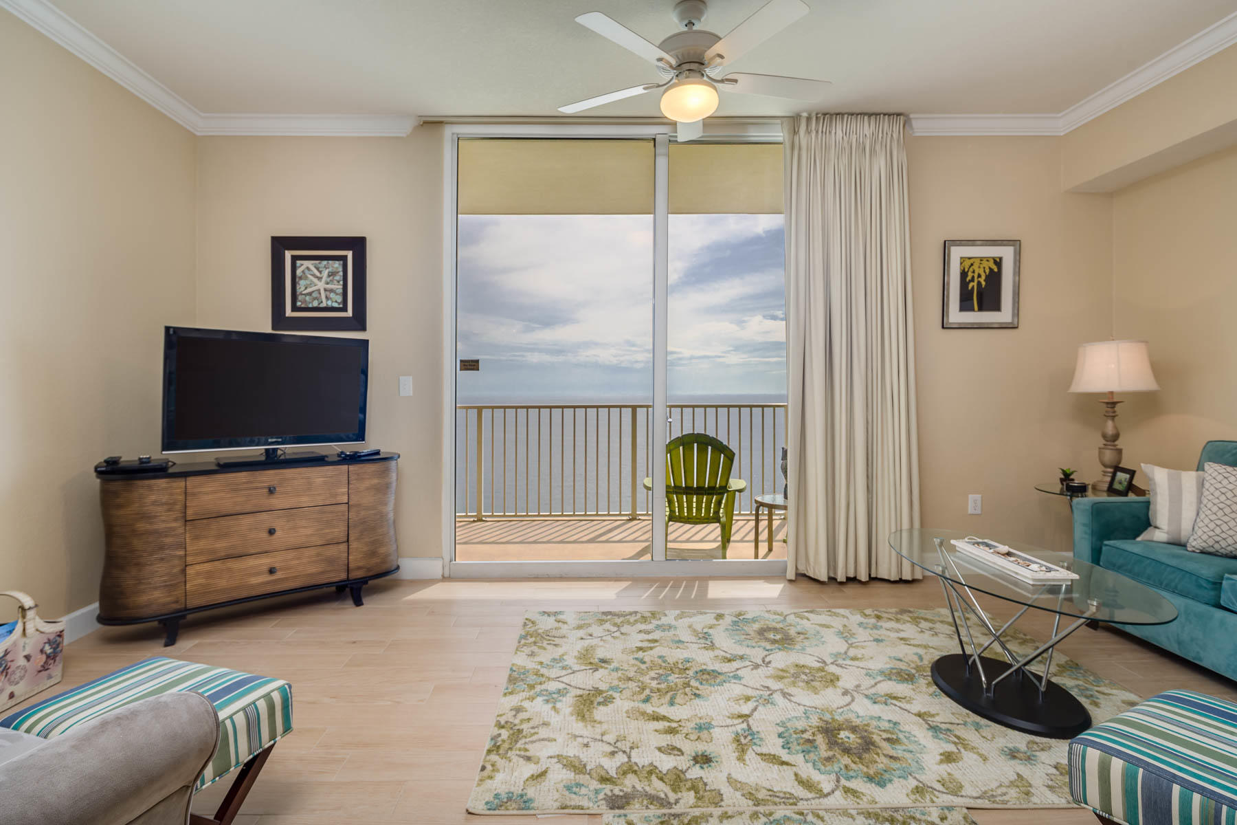Don't miss out on this beautiful, UPGRADED PENTHOUSE condo at Tidewater Beach Resort. This condo has been well maintained by the owners and it shows! Tidewater 2703 has beautiful furnishings and finishes. It has been UPGRADED with brand new flooring, white subway backsplash, stainless appliances, new rugs, mattresses and elegant light fixtures throughout. This unit boasts 9.5 ft ceilings which make the unit appear to be larger. Tidewater offers the best array of amenities on Panama City Beach such as gulf front gym with great views, 4 hot tubs, 2 outdoor pools, 1 indoor heated pool, game room, saunas, steam rooms, a restaurant, poolside Tiki bar, a convenience store, movie theater, covered parking, a conference room & an owners lounge. TIDEWATER IS ONLY 1/2 MILE TO PIER PARK!