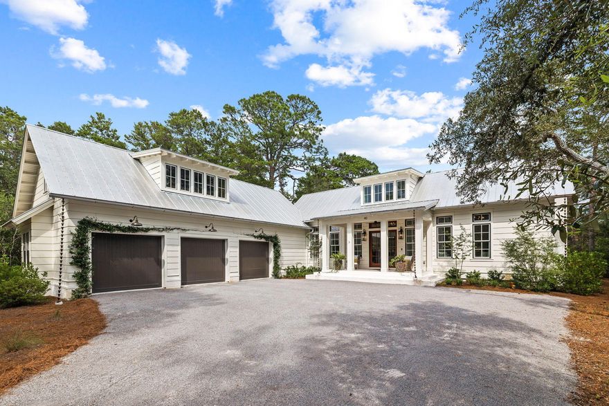 Step into the world of timeless elegance in the coveted Bay front community of the Estuary in desired Point Washington, where the perfect balance between architecture and design awaits. This traditional one-level custom home is both sophisticated and casual, offering a seamless blend of classically modern interiors and the natural beauty of the homesite. Built in 2021, the homes spans 2,626 sf. The thoughtful layout includes two primary suites, ensuring both comfort and privacy. The vaulted great room, with its soringg 16 ft ceiling, includes a wood-burning fireplace and lots of natural light. It's the perfect setting for relaxing after a day at work, the beach, or hosting a holiday gathering for friends and family. The living space extends beyond the great room to a large, screened porch including an outdoor fireplace and television. Whether it's morning coffee with a gentle breeze or a candlelit dinner under the stars, the Ipe wood outdoor deck provides yet another option to enjoy the peaceful surroundings of the .44 acre lot which has an irrigation pump and well to maintain the grounds. The design of this custom home provides the comfort and convenience of a full bathroom and large closet in each of the three bedrooms. The shiplap walls, custom cabinets, large island with storage, and expansive solid surface countertops create a seamless fusion of style and functionality. Your inner chef will delight in the well-equipped kitchen, which features a Wolf Sub Zero appliance package, serving to inspire and execute flawless culinary creations. The three-car garage, large motor court, and long drive accentuate this property's refined curb appeal. The garage offers space for multiple cars, a golf cart, or even a boat, and includes extra storage closets for tools and equipment. Need even more storage? The 912 sf accessible attic also provides ample room for all your cherished possessions or, if desired, the possibility of adding additional heated and cooled square footage. The stunning walnut floors and designer finishes, including custom tile, and large pantry with built-in shelving, make this residence not only functional but also the definition of luxury living. The great open floor plan maximizes space, emphasizing an attention to detail. The overall design of the home expresses welcoming sophistication, inviting you to immerse yourself in this quiant retreat you may call home. Welcome to a place where the charm of coastal living merges with comfort and elegance. This is a chance to own an exceptional gem in the heart of the Estuary. Come, explore, and experience this unique sanctuary tucked away from the hustle and bustle of 30A but only 8-10 minutes from Grayton Beach, Seaside, and several public beach accesses. This intimate, non-rental boutique community of only 39 homesites is an extraordinary neighborhood to call home while also enjoying the Santa Rosa Beach life!