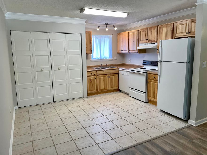 Updated 2 Bedroom/1 Bath condo features vinyl plank flooring throughout living room and bedrooms. The kitchen has updated wood cabinets, new dishwasher, large pantry and space for dine-in area. The unit is located on the end of the 2nd floor, with no units above. Complex amenities include community pool, laundry facilities, assigned parking space and BBQ/picnic area.