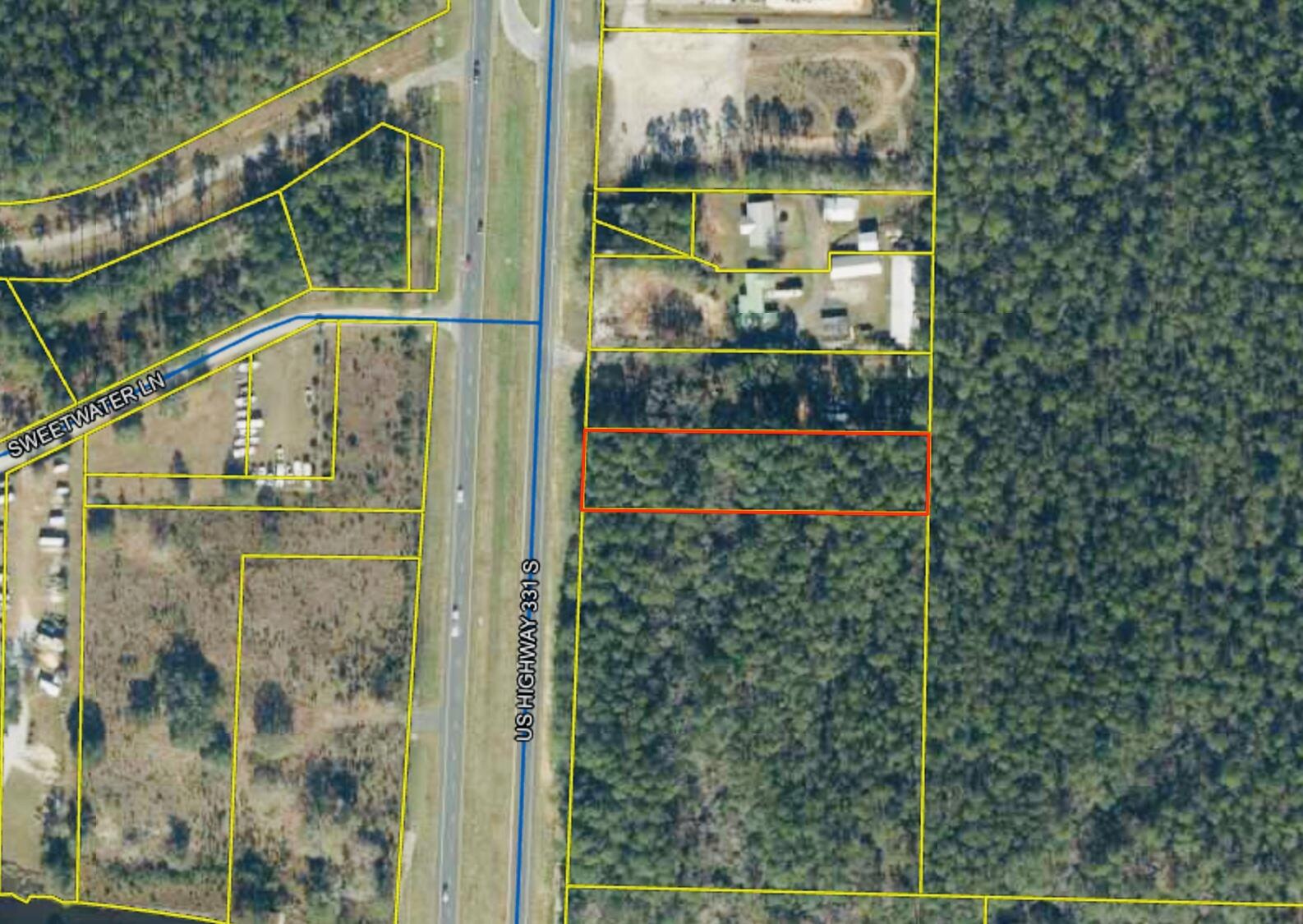 OWNER FINANCING AVAILABLE!! This 1.04 acre parcel has 100 feet of road frontage on heavy traffic highway 331 and could be the perfect property for your next business. Freeport is absolutely booming and the opportunities for this lot are endless. It's located approximately 3 miles to 331 bridge, 3 miles to Publix, and 10 miles to the beach. It's currently zoned as Rural Village but surrounded by Heavy Industrial and General Commercial. Buyer should verify with Walton County on rezoning and future land use. The wetland survey shows to only have .0125+/- acre of wetlands and the rest showing high and dry! Buyer responsible for making sure all information is accurate and up to date. Take a look at the Economic Development Corridor Plan on the Walton Co. website!