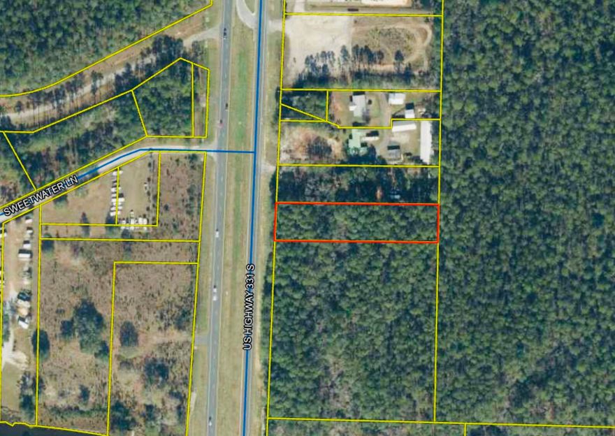 OWNER FINANCING AVAILABLE!! This 1.04 acre parcel has 100 feet of road frontage on heavy traffic highway 331 and could be the perfect property for your next business. Freeport is absolutely booming and the opportunities for this lot are endless. It's located approximately 3 miles to 331 bridge, 3 miles to Publix, and 10 miles to the beach. It's currently zoned as Rural Village but surrounded by Heavy Industrial and General Commercial. Buyer should verify with Walton County on rezoning and future land use. The wetland survey shows to only have .0125+/- acre of wetlands and the rest showing high and dry! Buyer responsible for making sure all information is accurate and up to date. Take a look at the Economic Development Corridor Plan on the Walton Co. website!