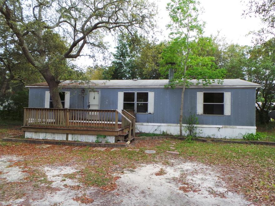 Nice mobile home in the Holley/Navarre area. Home features vaulted ceilings, fireplace in living room, breakfast bar and indoor laundry room. The master bath features a double vanity and jetted tub. You will also find a nice open deck. Great home for a great deal! Don't miss out!