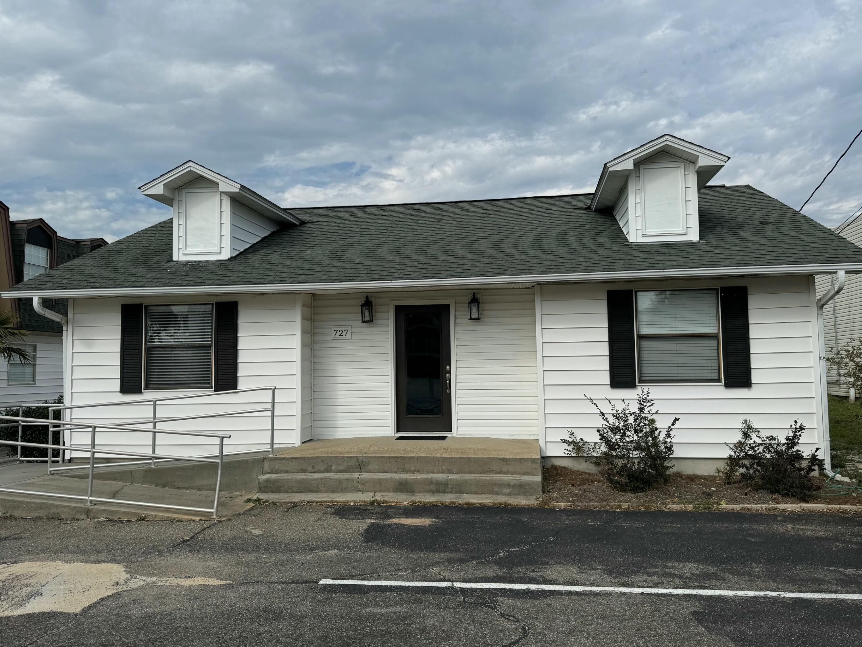 This single-story building on the north side of Highway 98 just east of Destin Harbor currently features six offices ranging from 11' x 11' to 12' x 15', a kitchenette and two washrooms. The large conference area is 13' x 15', has a separate washroom and is accessible via a back door with separate parking area. The front entrance has steps and an ADA access ramp.