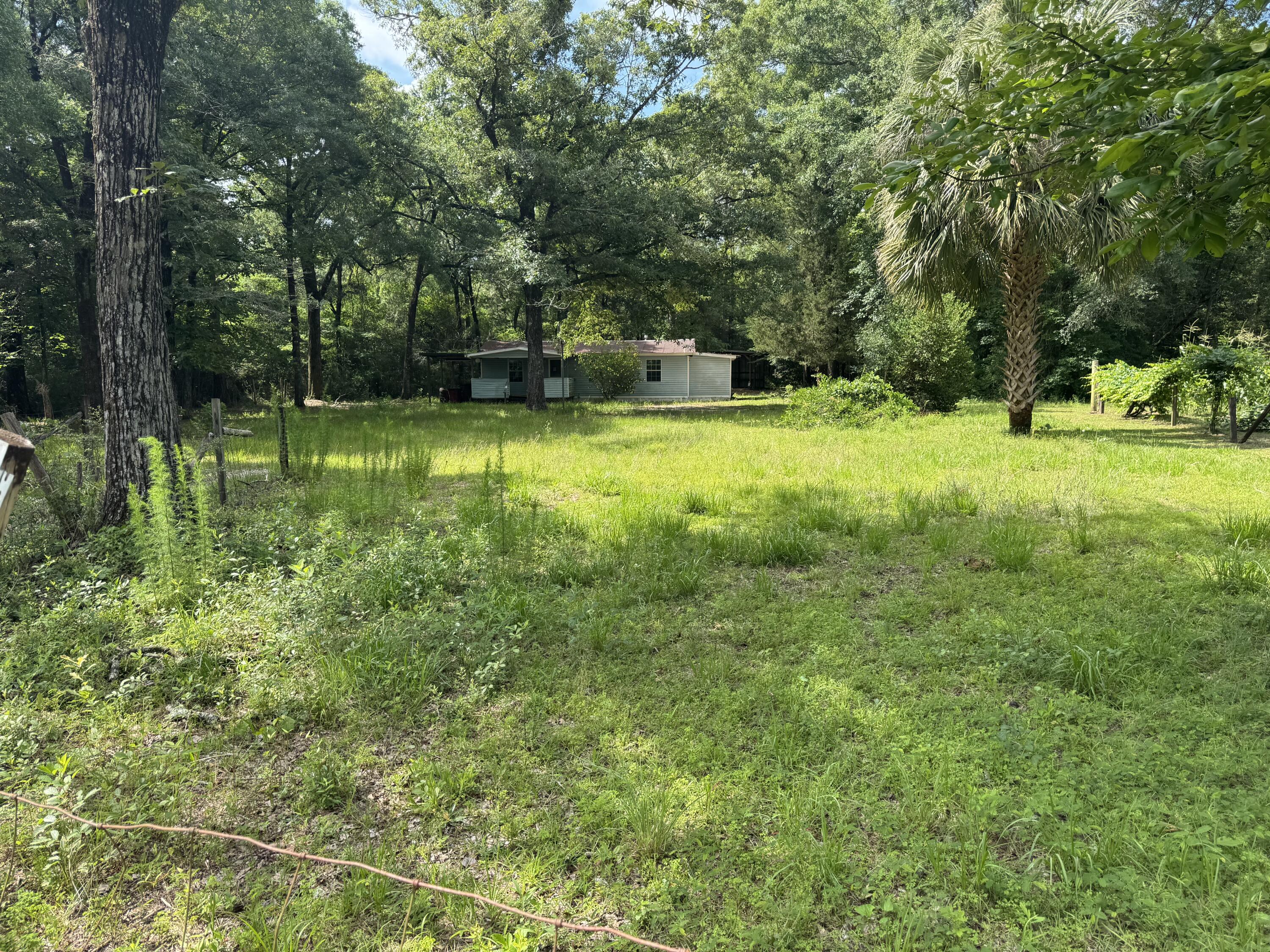 Investor Special. House in disrepair. Could be Restored or removed for a mfg home.All Utilities are there. Use caution inside the house.Bring an offer.