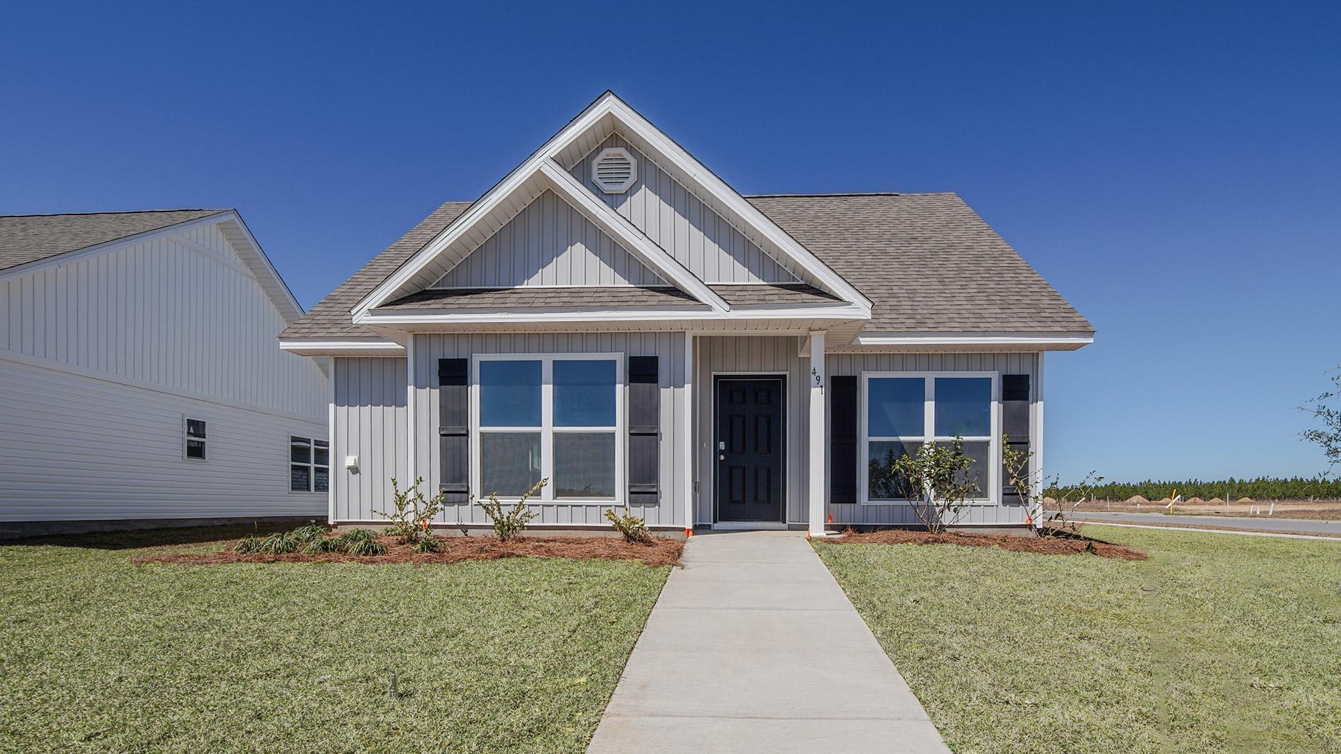 Welcome to 491 Arrowwood Blvd, a new home at Owls Head Farms East in Freeport Florida situated on a corner lot. This home is a ready for move in and is a thoughtfully designed three-bedroom, two-bathroom home that combines modern living with functionality. Its open-concept layout creates a seamless flow between the main living spaces, making it ideal for both family life and entertaining. Upon entering the home, you're greeted by a spacious foyer that leads to a dining room, perfectly positioned to serve as a formal dining space or a versatile area for other uses, such as a home office or playroom. The living room is a standout feature of the Mason floor plan, with large windows that let in an abundance of natural light, creating a bright and welcoming ambiance. This space opens directly to the kitchen, allowing for easy interaction between family members or guests while cooking or relaxing. The open layout ensures that the living areas feel connected and spacious, making it perfect for gatherings or quiet evenings at home.
The bedrooms are thoughtfully placed to maximize privacy and comfort. The primary suite offers a retreat-like feel, complete with a well-appointed bathroom and ample closet space. The two additional bedrooms are ideal for children, guests, or even a home office, making this floor plan flexible for various lifestyles.
One of the unique features of this home is its front entry paired with a rear-load two-car garage. This design enhances curb appeal while maintaining functionality. With its modern features and practical layout, the Mason floor plan is perfect for homeowners seeking both style and convenience.