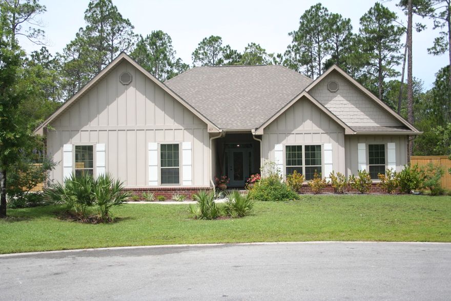 Pretty home in Point Washington! Wonderful neighborhood only 5 miles from Grayton Beach. This spacious home has hardwoods, granite countertops and stainless steel appliances. Breakfast room and larger dining room. Dual vanities in master bath with soaking tub & separate shower. Large master bedroom and large master closet with custom shelving. Relax outside on the screened back porch overlooking the large fenced backyard. Other exterior features include 2 car garage, irrigation system, gutters, & incredible raised gardens with fig trees, tomatoes, okra and eggplant to name a few. One of the best features - it's all on one level on 3/4 acre! Seller is licensed Realtor in the state of Florida.