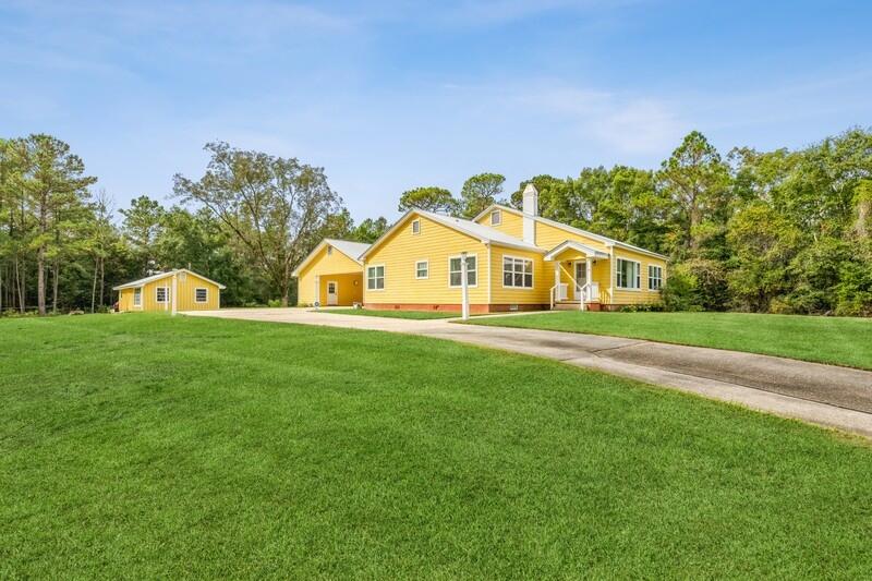 Impeccably restored and updated home in the heart of Defuniak Springs with plenty of room to roam! Featuring 4 bedrooms and 3 baths and originally built in 1938, this home features a touch of modern but with important design elements and original features left in tact. Split bedroom design with the modern family in mind. Open modern kitchen with plenty of room for an island and for guests to gather. Clean white cabinets, countertops and matching appliances bring out the rich wood floors featured throughout the home. Master bedroom is roomy and bright. Formal dining room features original wood floors and a quaint brick fireplace. Additional bedrooms are ample size in keeping with the design of the day. Outside is an oversized carport, keeping you out of the elements no matter the season. Additional exterior features include an additional matching storage building, a picturesque old style barn with plenty of covered storage and approximately 5 acres of land to include some pasture or grazing areas. Make an appointment today to see this gem in the heart of Defuniak Springs today!