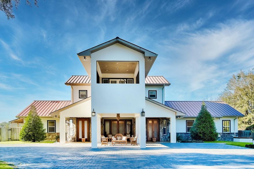 The ultimate in luxury and tranquility of living on waterfront in the country! Disconnected from the hustle and bustle, a country home offers a serene and quiet lifestyle.  With this inviting waterfront estate nestled among quiet waters and fertile land, explore some of the best landscapes nature's paintbrush has to offer. Make the comfort and ease of a countryside home a reality by purchasing this rare 13 acre sanctuary.  This sale has two parcels of land that may have potential to build other homes on the property.  Please contact the city of Freeport, Samantha Graves,  Planning Technician, Planning & Zoning Department,City of Freeport,  (850) 835-2340 ext. 218for more information.One enters this exclusive gated property to a beautiful' winding tree lined drive with magnolia, live oak