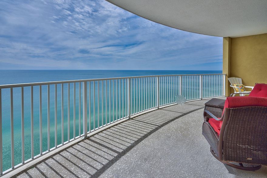 Located on the desirable west end of Panama City Beach, Emerald Isle is approximately three quarters of a mile west of Highway 79 leading to Northwest Florida Beaches International Airport, and just a mile further from shopping and dining at Pier Park. This beautifully appointed unit can be found on the 17th floor of this gulf front building. Attractive stone floors carry throughout its principal living areas and into its waterfront master bedroom. Each share access to a bowed balcony showcasing panoramic views over the emerald gulf waters. The guest bedroom has been updated with new carpet. Building amenities include two levels of covered parking, a gulf front pool joined by an additional indoor pool and whirlpool, as well as a fitness center and beach access.