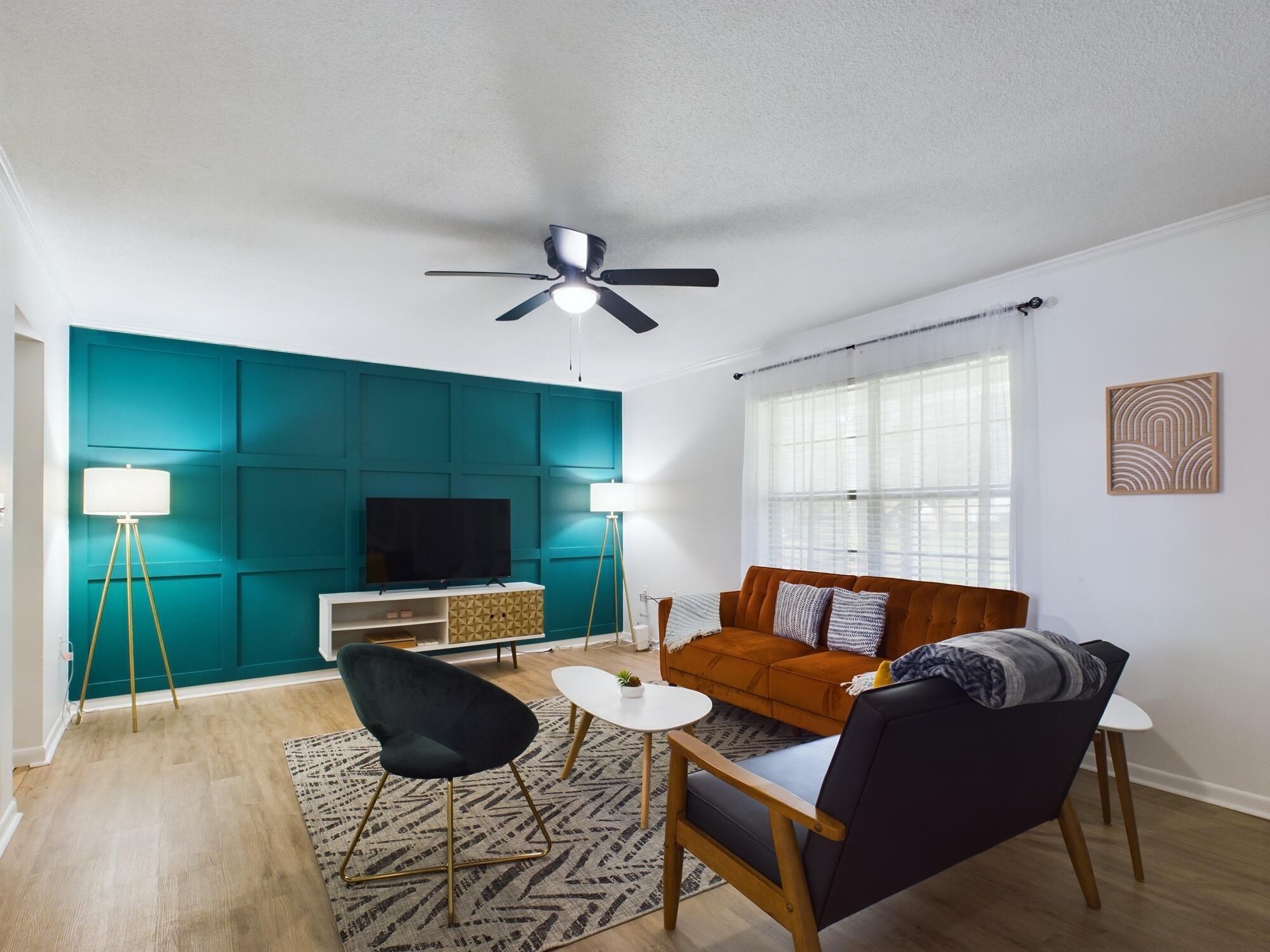 This spacious end-unit townhome offers more room than others in the area, complete with a community pool and major updates throughout. Enjoy new luxury vinyl flooring, updated kitchen cabinetry, quartz countertops, and modern appliances. The bathroom is enhanced with quartz counters and a cultured marble shower stall. Upstairs features two generously sized bedrooms, while the main floor hosts a welcoming kitchen, living room, and half bath. Perfect for entertaining guests over a home-cooked meal. The covered back patio, overlooking the pool, provides a relaxing retreat. HOA covers termite protection, lawn and pool maintenance, exterior surface and roof maintenance, trash, and adjoining fences. Move-in ready, don't miss this one!
