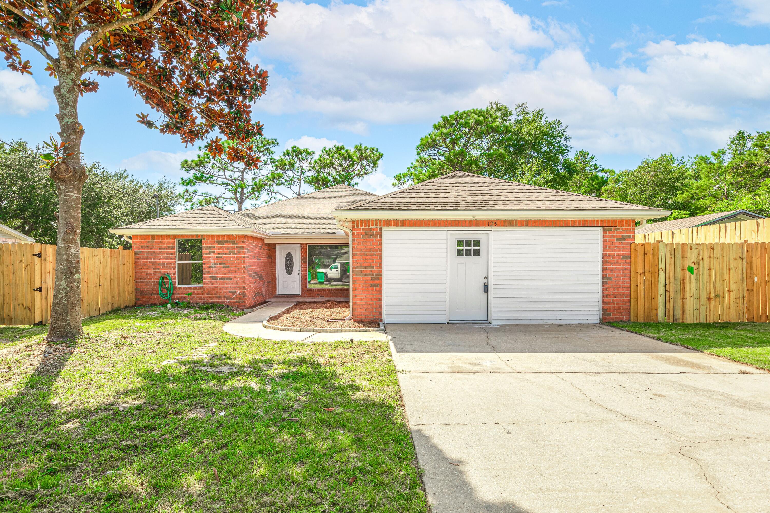 COMPLETELY REMODELED 3BR 2 BTH home with an office and extra heated/cooled area great for gym, crafts room or play area! UPGRADED finishes include NEW kitchen cabinets with soft closing drawers & granite tops; LVP floors throughout; updated bathrooms; new doors & freshly painted walls throughout, new appliances, new contemporary-freestanding bathtub. Cathedral ceilings and a lovely breakfast bar. Located at the end of the street so no traffic. Perfect for a relaxing evening & morning coffee. Only 5 min from Hurlburt Field & 20 min from Eglin. Move in ready to enjoy all the amenities the beautiful Emerald coast has to offer. This gem won't last long!