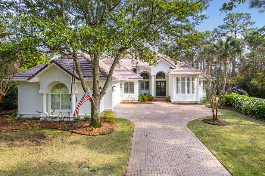 A total LUXURY Remodel is what you will find at 4564 Nautical Court!  This custom-built 3 bed, 3 bath home has been upgraded to boast a dream kitchen, all 3 bathrooms completely renovated, new hardwood flooring throughout, fresh paint, new trim, crown molding, and so much more (see a full list of upgrades in documents tab)!  This jewel of a residence is in a class of it's own with custom craftsman interior design, located in the exclusive gated golf course community of Regatta Bay on the Emerald Coast. 

Walking up the paver driveway, past the three-car garage, you are greeted by a gently flowing water fountain as you approach the double door entrance.  Entering the spacious foyer you get a wonderful first impression of this split-floor, ranch style home, that is bright and welcoming. The family room is designed in such a way that light filters in beautifully through the windows making it an inviting space for conversation.  The tall ceilings combined with the French doors leading to the lanai outdoor living area make this room have a flow and rhythm of its own. 

The family room shares a partial wall with the formal dining room, styled in a board and batten panel pattern. The dining room is open and inviting for entertaining friends with a built-in wet bar featuring an upgraded white marbled quartz countertop and backsplash, tastefully painted cabinets with accent hardware, and a candlelight drop chandelier.

The brand-new luxury kitchen has been entirely reworked to maximize space, workflow, and comfort!  The quartzite countertops are show stopping gorgeous!  With the deep green color of the counters, the custom floor-to-ceiling white cabinets pop with a finishing touch of golden pulls.  The deep farmhouse sink is adorned with gold faucets and wooden trim finishes.  You literally only see this in magazines.  On top of being beautiful, this kitchen is sure to impress even the most skilled chef.  It is outfitted with Bertazzoni stainless steel appliances, a custom range hood, a KitchenAid double refrigerator, and a wine fridge.  A bonus drop zone and a designated coffee/tea station have been added as a walk through to your pantry and exits to the hallway.  If that was not enough to impress you, no detail was overlooked to include new lighting over the bar, soft-gray tiled backsplash, custom shelving in the pantry, and soft-close drawers.

The kitchen shares a common space with the living room.  The cozy living room sits off to the side of the kitchen inviting the family to gather in a variety of ways.  This space has a custom shiplap trimmed fireplace painted in a soft gray for those rare cool Florida nights.  The space is convenient for being together as a family amid busy schedules allowing dinner to get on the table, homework completed, and the news watched all while sharing each other's company.  

The breakfast room is located at the backside of the kitchen/living room open concept space.  It is an ideal spot for a more casual family dining.  The soft lighting fixture sets a relaxed tone making one feel cozy and at home.  The space features newly trimmed accent walls with gold light fixtures in which to highlight your treasures. 

The master bedroom ensuite features a spacious room with a high tray ceiling paired with an elegant yet simple chandelier.  The room is bathed in light from the private backyard and French glass doors that exit to the lanai.  The focal feature in the room is a Spanish tiled fireplace trimmed in a custom mantel.  Additionally, there are his and her closets decked out with custom closet organization. 

The master bathroom has been totally overhauled.  Double vanities display a clean white marbled quartz countertop that shine on top of cabinets painted in a dark charcoal and finished with gold pulls.  The new tile floor is a work of art that compliments the cast iron clawfoot tub for soaking your burdens away.  The walk-in shower has a clean look with new tile and new gold plumbing fixtures.  

Both ensuite guest bedrooms are spacious and inviting.  They feature new fan/light combos, plantation shutters, and custom closet organization.  Both full bathrooms have been outfitted with artful tile floors, new showers, new vanity lighting, new cabinetry, and white marbled quartz countertops.   

On the occasion you need to attend to professional matters, the home has an established office space.  The office is appointed with French doors, an intricate Capiz shell chandelier, and views of the front yard.

The outdoor living space is 600 square feet of relaxation.  The large lanai encompasses a pool with two water features that provide a peaceful ambiance while swimming, soaking in the hot tub, or grilling at your custom outdoor kitchen.  The space has been enhanced with a tongue and groove wood ceiling, freshly painted pool coping, and new lighting/fans. 

If you ever decided you need to leave this luxury space, you can extend your enjoyment to all the amenities that the community of Regatta Bay offers.  These include a full-sized swimming pool, a kiddy pool, playground, and a Top ranked 18-hole golf course with clubhouse.