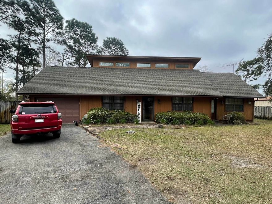 Investor Alert! Tenant occupied until April 1st, call for showings starting on the first week of April. Beautiful property located in sunny Navarre Florida! This property is very unique. This 2 story property sits at 1998 sqft and contains 3 beds and 3 full baths. This property has a large backyard with a large shed. Property will need TLC. As-is Sale. Roof updated 2023. Hvac updated in 2020.