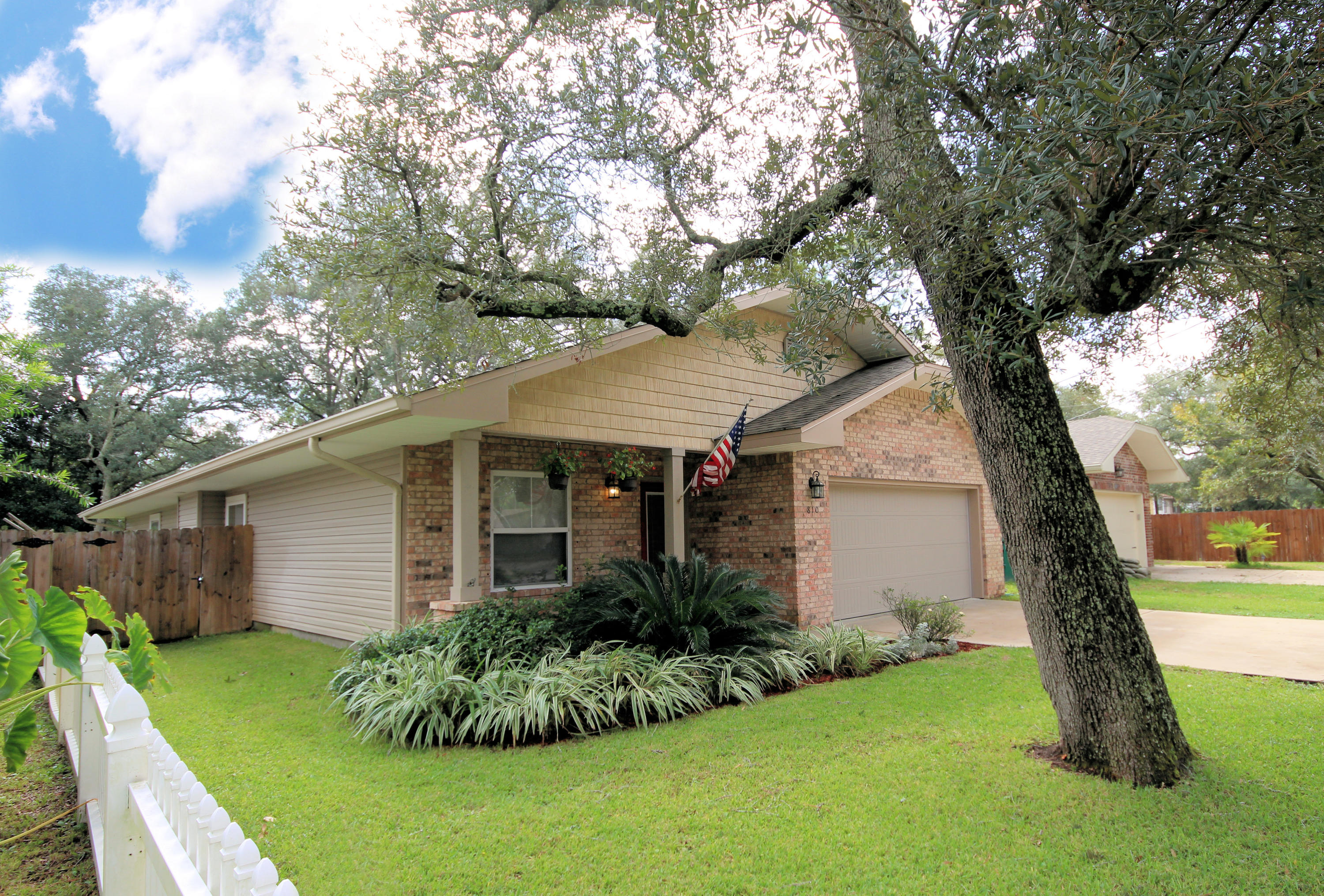 Beautiful beach cottage style home located conveniently between Eglin AFB and Hurlburt Field! This home backs up to the Fort Walton Beach golf course with amazing curb appeal. Through the covered porch bedrooms 1-3 are on your left. The hallway then opens into your kitchen/breakfast bar area that is fitted with granite counter tops, stainless steel appliances (with commercial grade refrigerator and freezer) and maple cabinetry. With 9 ft ceilings the kitchen opens into the great room. A laundry room conveniently located at the rear of the kitchen. Passing your over-sized master bedroom fitted with his and her's walk-in closets. You'll find a covered porch perfect for entertaining. Call to schedule a showing today!