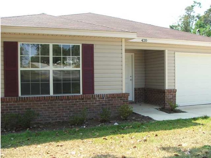 Cute 3 bedroom 2 path house with spanish lace ceilings (no pop-corn to clean up),custom cabinets,smooth top stove,microwave range hood, pantry, and a garage door opener. Convenient to town! This home features Tile floors,a cathedral ceiling, garden tub, huge walk in closet and a Large lot 180 Feet deep!!Double french doors take you to the back yard where there is plenty of room for a pool or a ball game!