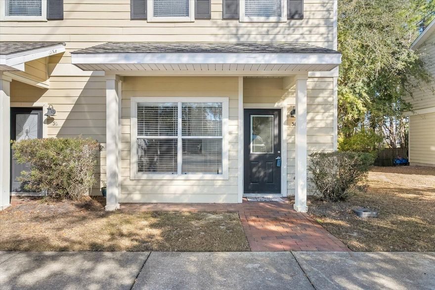 3E at the Palms is full of natural light, charm, and modern updates, finishes, and new appliances.  The unit is a corner unit with a back deck that is open to the peace of nature from the shade of the trees and the views of the surrounding woods.  Kitchen and Bathroom are both updated with granite counters. The Kitchen has brand new appliances, luxury kitchen sink and faucet, convection and air frying oven, with classic white subway tile accents.  Vinyl Plank floors with craftsman baseboards and molding.  Kitchen has a pantry with large storage in the cabinets.  AC condenser is 2017, and Water Heater and Furnace are both June of 2020.  Roof is June 2022.  Stylish, modern lighting throughout home and luxury finished continue into the half-bath downstairs and second and master bath upstairs Spacious closets below the stairs, in the bedrooms, and a linen closet allow for plenty of storage.  Laundry can hold full size washer and dryer.  Master Bedroom overlooks back deck and woods with scenic view, his and her closets, and connecting master bath.