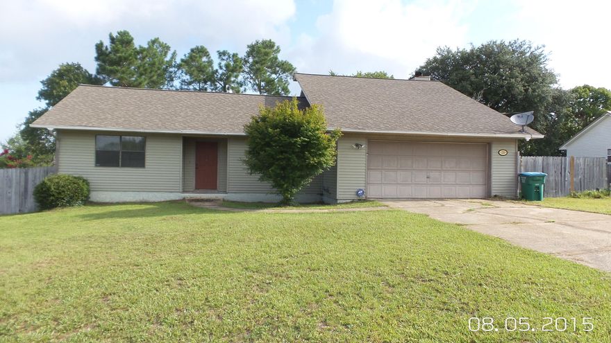 Home was custom built and has been well maintained. There are two separate living areas and a open airy feel you will love. Vaulted ceilings and open kitchen really add to the overall appeal and makes this home live larger than it is. Just off the kitchen is a walk-in pantry with room for a freezer. The split bedroom plan is very functional and as an added bonus there is a door off the master bedroom to the open deck. The screened in back porch and large yard are great for relaxing, playing or entertaining. Call for an appointment today.