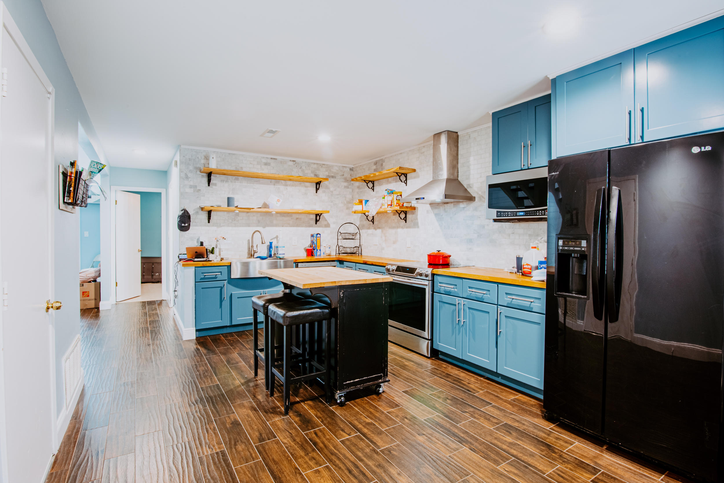 This well-equipped non-HOA townhome in the heart of Destin, is move-in ready. The current owner installed a high-efficiency 16-seer, 2-stage Trane HVAC with Germicidal UV Light (10-year parts warranty) and upgraded the home to a 27KW Tankless Hot Water Heater system. From the custom kitchen, to the tongue & groove shiplap on the family-room wall, this is an opportunity for any buyer - 1st time home buyer, rental investor, etc.The sliding glass door leading to the outdoor space is convenient and ideal for grilling and gathering with friends and family. The garage was converted to heated/cooled living space, so it can be used as a work space or a bedroom, or it can be reverted back to a garage. The fenced back yard allows for privacy, and for pet lovers who want additional space.