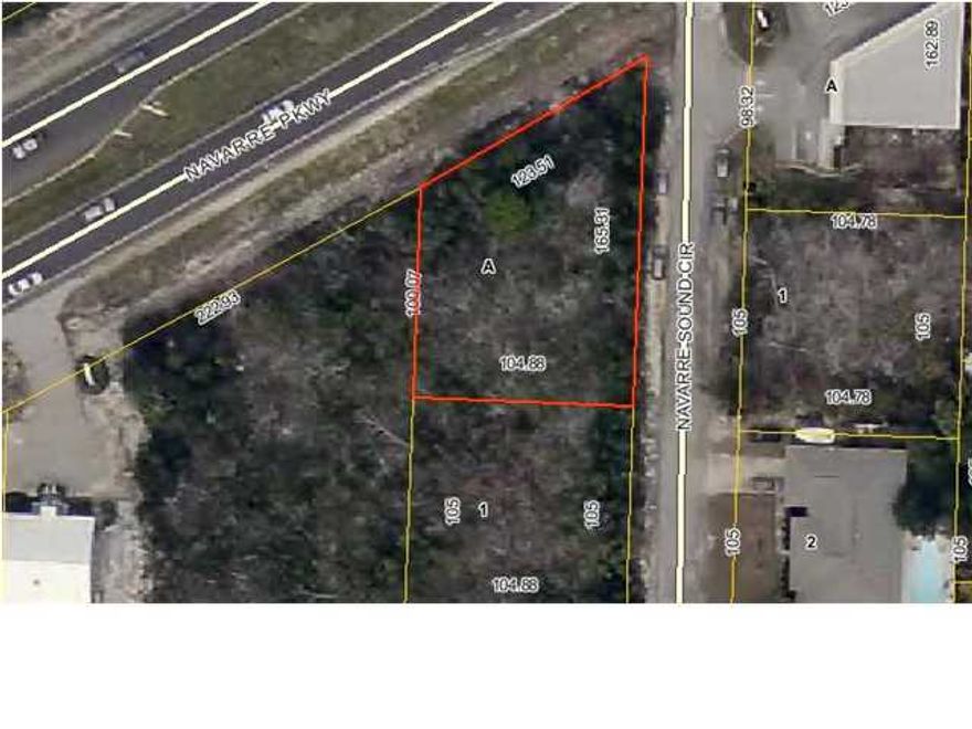 This property is centrally located in Navarre and features 125ft of frontage on Hwy 98. Its .32 acres and zoned HCD.