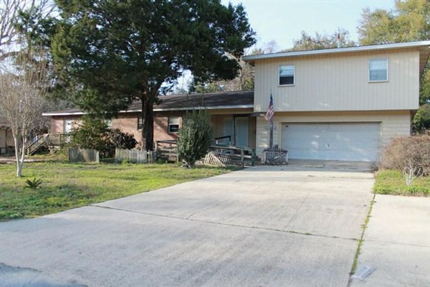 FORECLOSURE FORECLOSURE!!! Large house with many living options. Main part of house on ground level has 3 bedrooms & 2 baths. At the West end of the property there is a separate exterior entrance for a possible tenant with a lock out option. This Room has living/Bedroom combo, Full Bath & Kitchenette. Above the Garage is separate living quarters with a exterior entrance on the back side of the property or via entrance from stair case in garage. This separate apartment has 2 bedrooms, bath, living room & kitchen (needs work). PROPERTY TO BE SOLD ''AS IS''.
