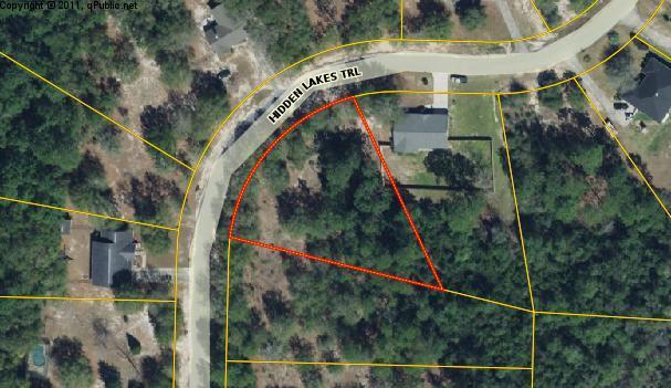 Beautiful home site in one of the nicest subdivisions in town. Lightly wooded large lot close to town and schools. Juniper Lake park , Lake Stanley Park and Wee Care Park are almost within walking distance. Beaches are less than a hour away. Underground utilities and paved street.