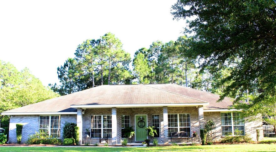 Quintessential Florida Living and Entertainer's Dream!! This IMMACULATE Holley by the Sea home is extremely unique in design and sits on a pristine Park-Like corner lot in this well-established community. This home has been maintained and cared for meticulously and it shows! Vaulted ceilings and gorgeous archways greet you when you enter from the spacious and welcoming front porch. The spacious kitchen is perfect for entertaining and provides plenty of room for you, your family, and guests. There are 3 spacious guest rooms and a very LARGE Master Suite that has its own access to the rear lanai. A Jack-and-Jill bathroom connects 2 of the roomy bedrooms and a convenient Half-bath is nearby for guests. The Park-Like backyard is perfect for those summer parties or simply to relax!