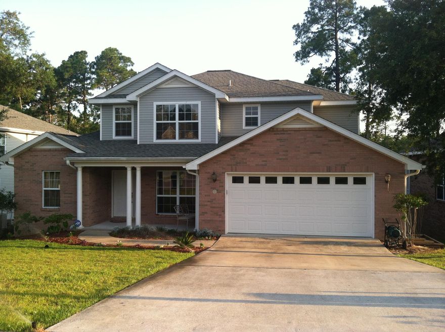 Beautiful home with the modern/updated feel that everyone wants but is hard to find. This 4/2.5 bedroom home has a kitchen that comes with all appliances, granite counters and an island. Hardwood floors grace the main living area and extra front room that could be used for formal dining or den. The kitchen has 18 inch tile. Master bedroom is downstairs with spacious bathroom and walk in closet. Three bedrooms upstairs with upgraded carpet and neutral colors to adapt to any decorating style. Enjoy the large low maintenance deck that backs to a natural area. Small back yard is not fenced. Sorry, no pets allowed & NO smoking. Available July 28. Reminder, anyone 18 or over wishing to live in the property must fill out separate applications.